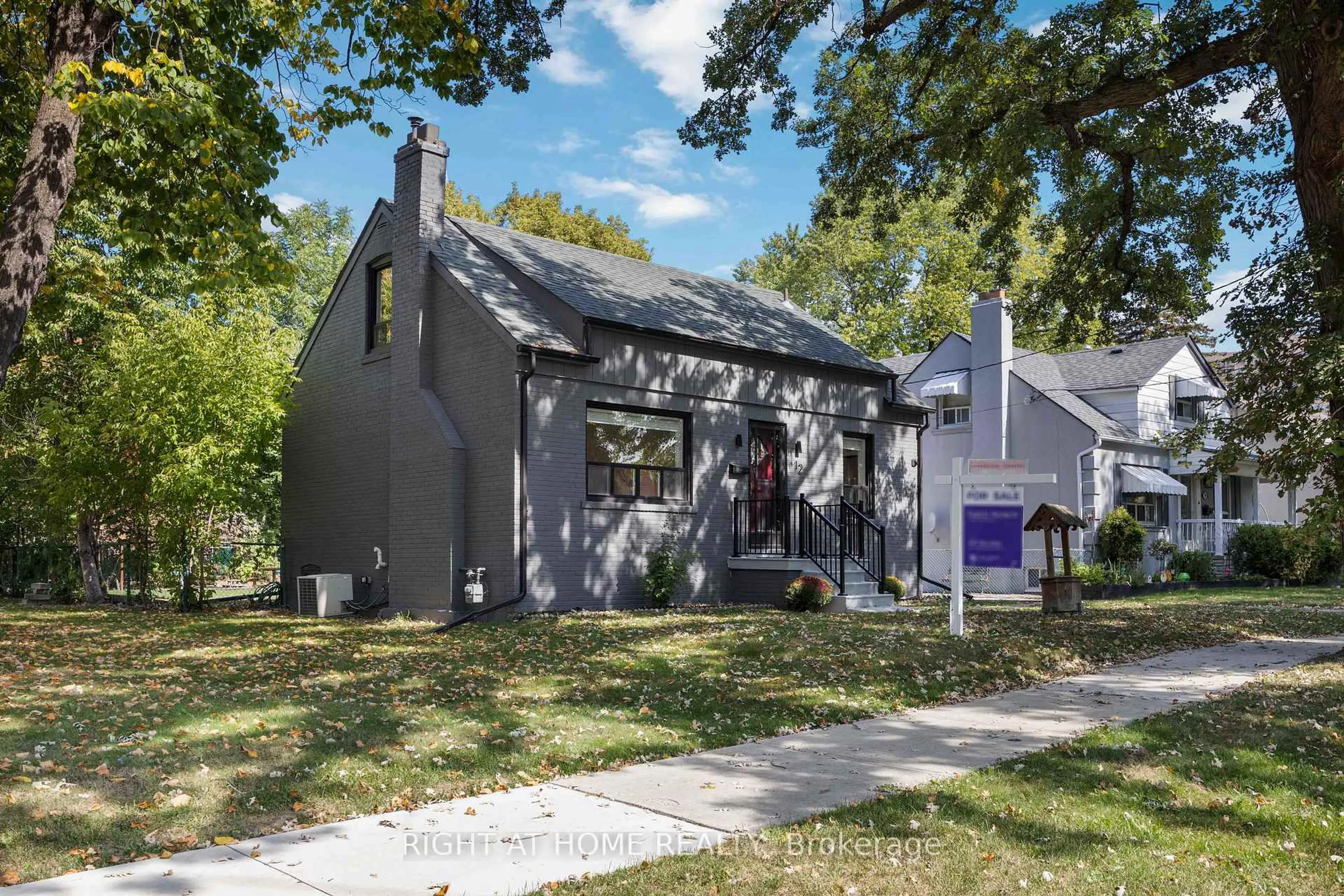 Home with vinyl exterior material, street for 12 Rosalie Ave, Toronto Ontario M3L 1C5