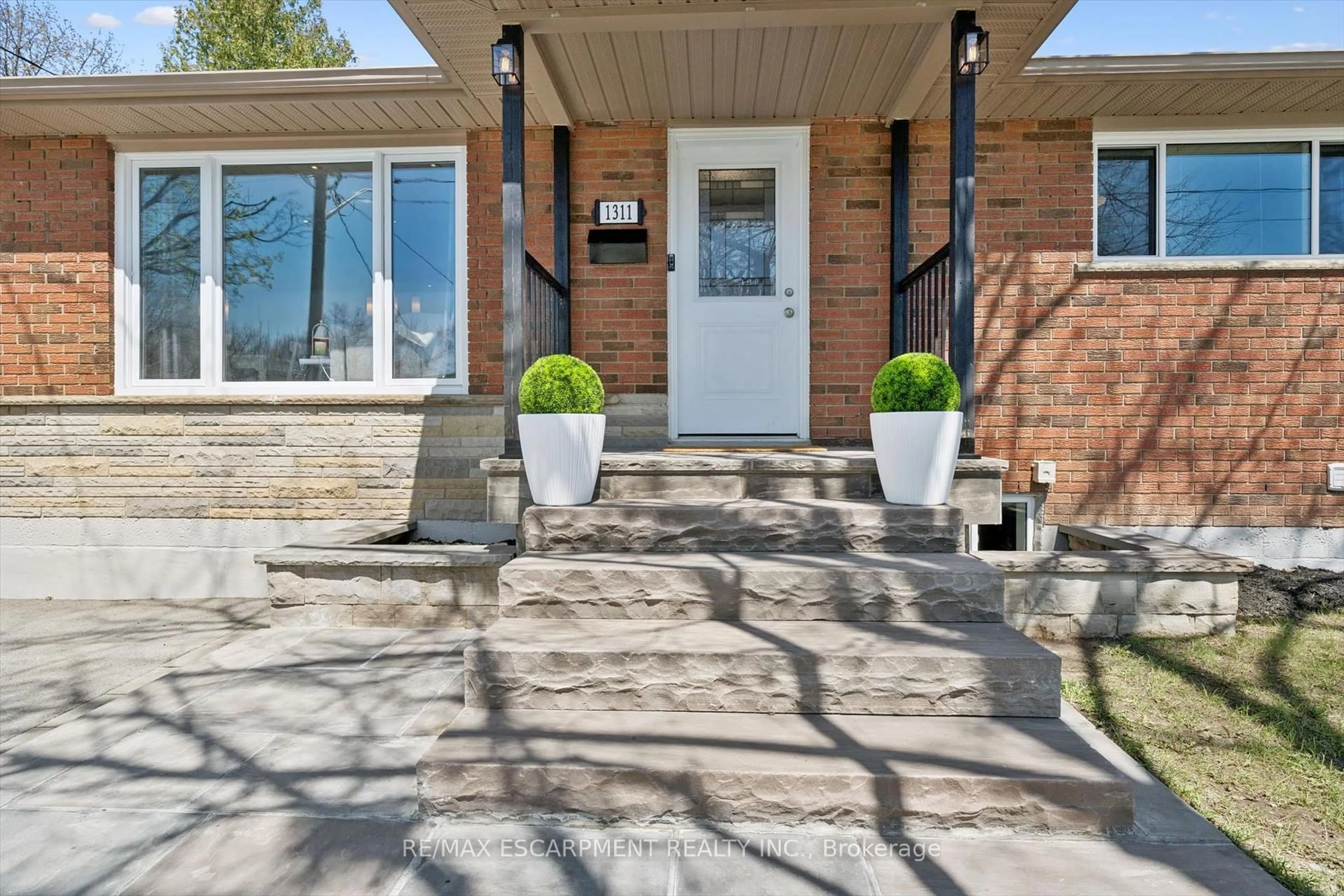 Home with brick exterior material, street for 1311 Royal Dr, Burlington Ontario L7P 2G2