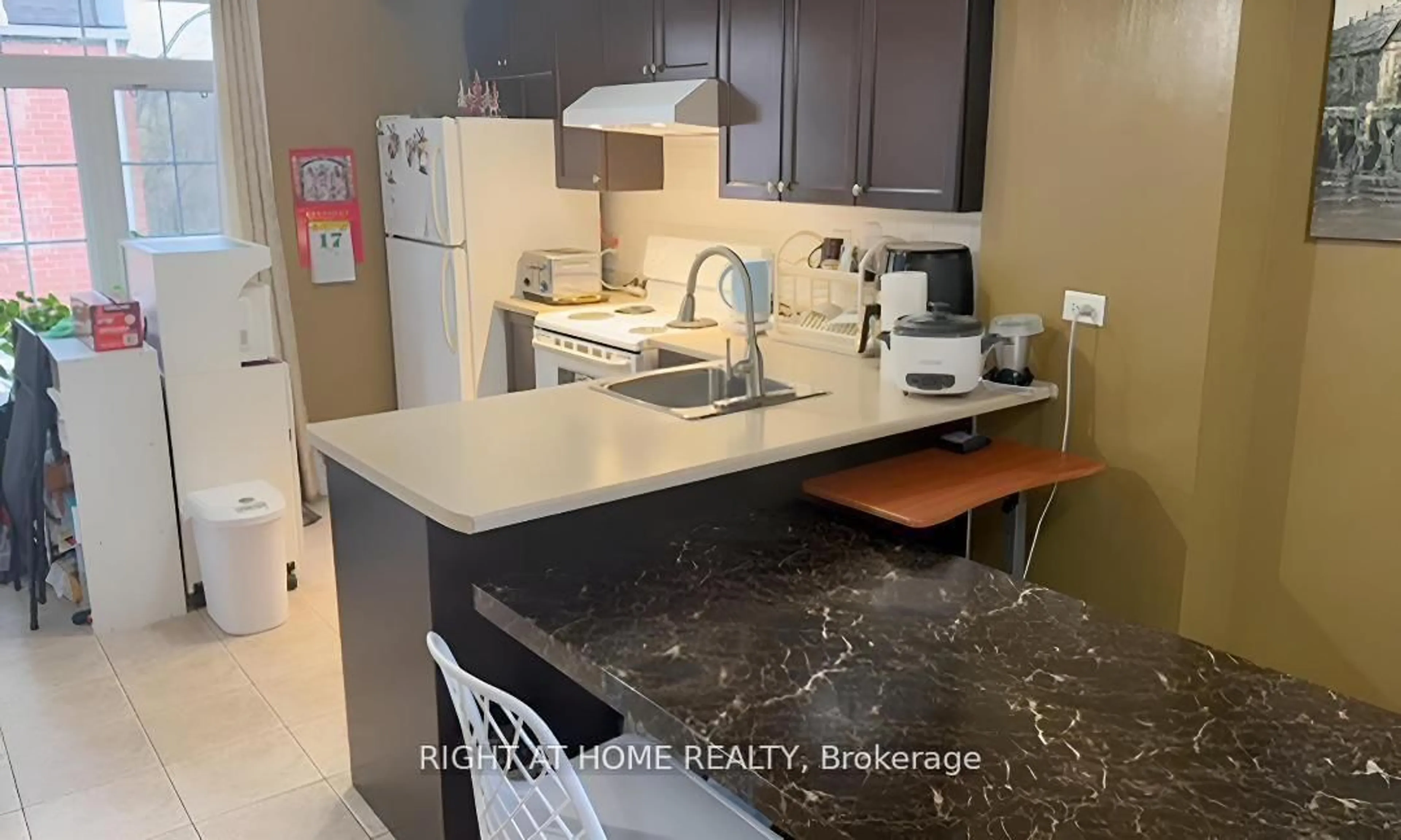 Standard kitchen, ceramic/tile floor for 870 Jane St #212, Toronto Ontario M6N 4C2