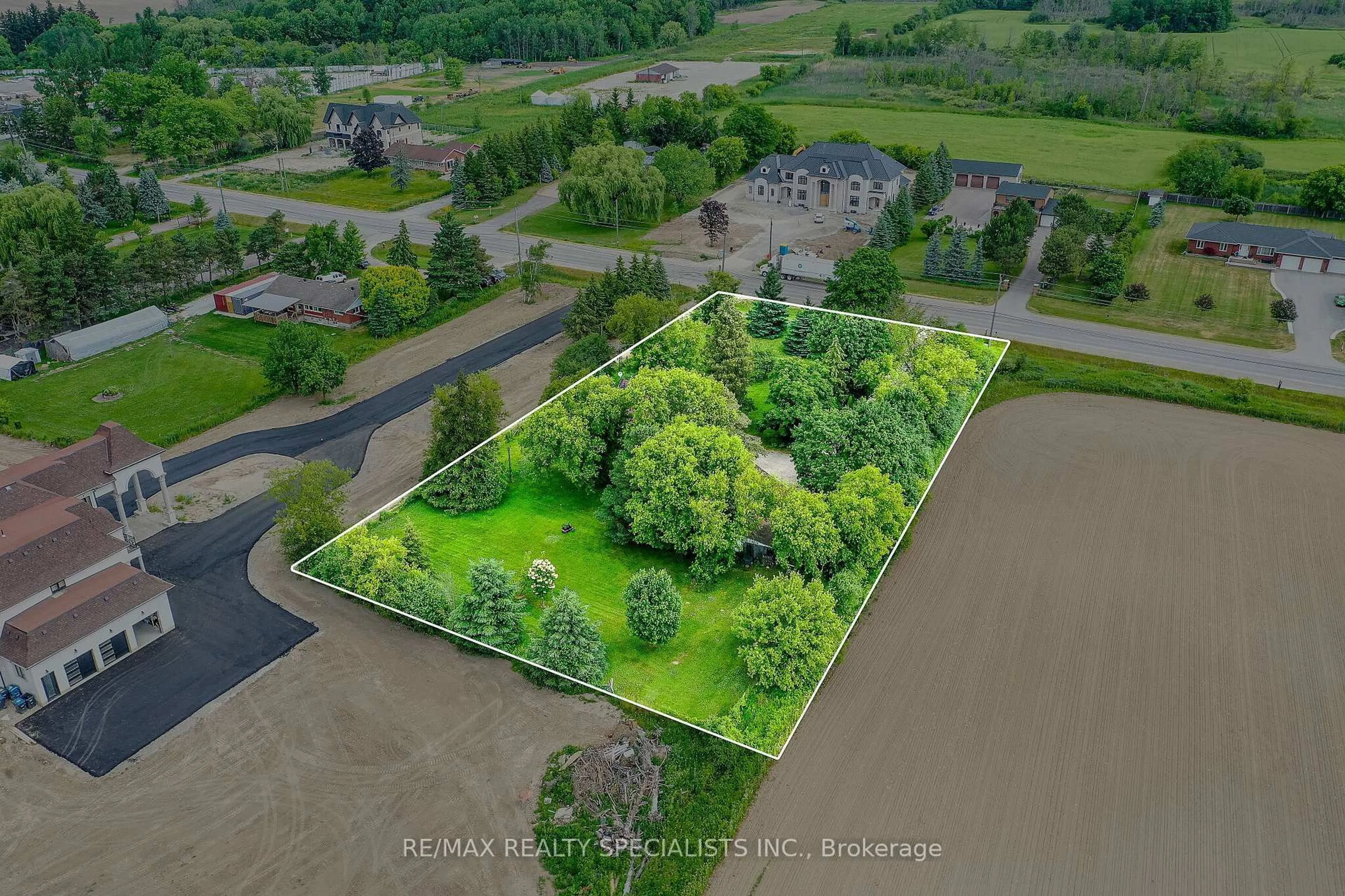 A pic from outside/outdoor area/front of a property/back of a property/a pic from drone, water/lake/river/ocean view for 15208 Airport Rd, Caledon Ontario L7C 2W7