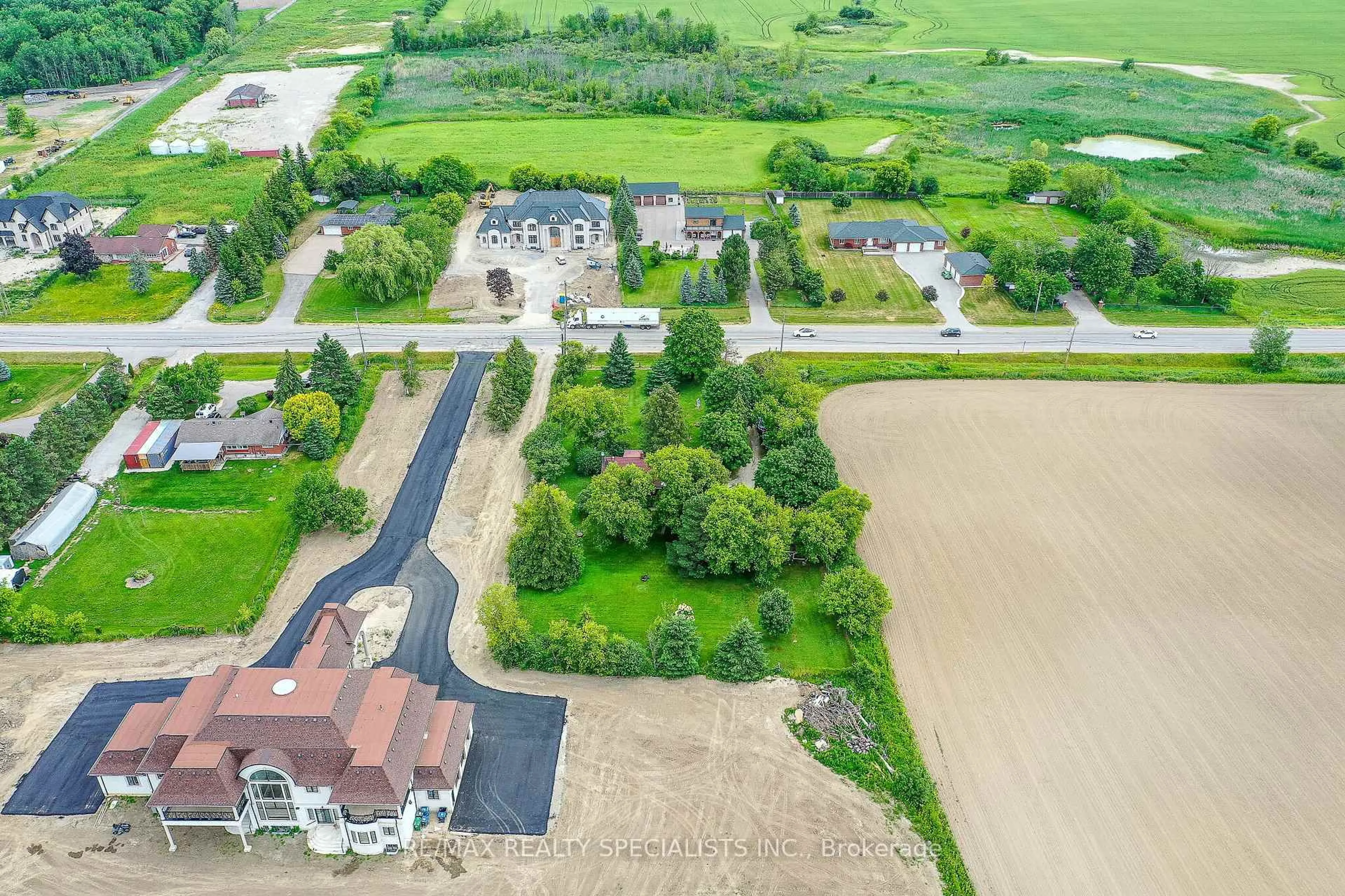 A pic from outside/outdoor area/front of a property/back of a property/a pic from drone, unknown for 15208 Airport Rd, Caledon Ontario L7C 2W7