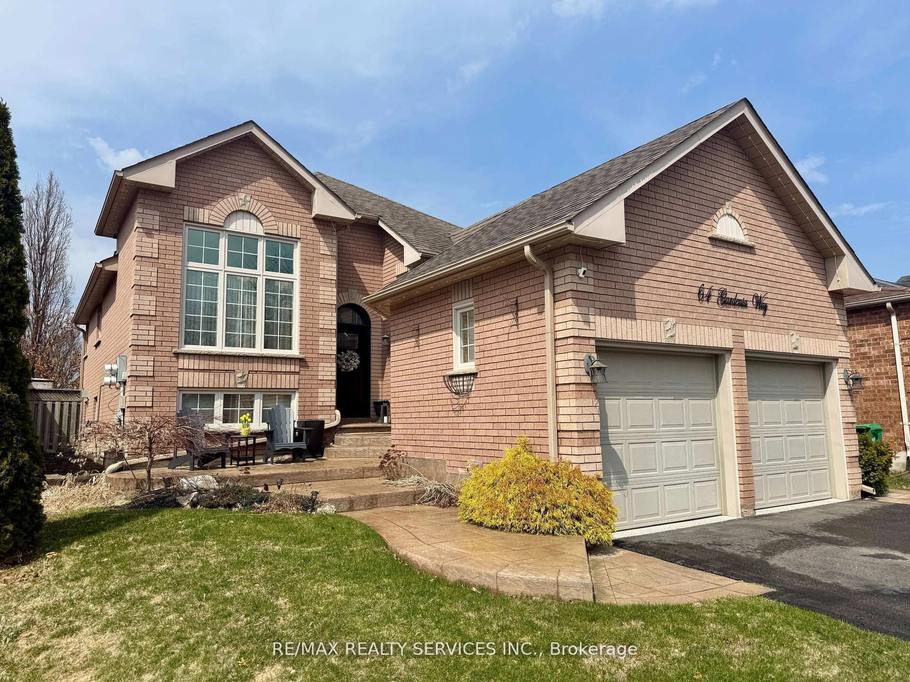 Home with brick exterior material, street for 64 Gardenia Way, Caledon Ontario L7C 1A8