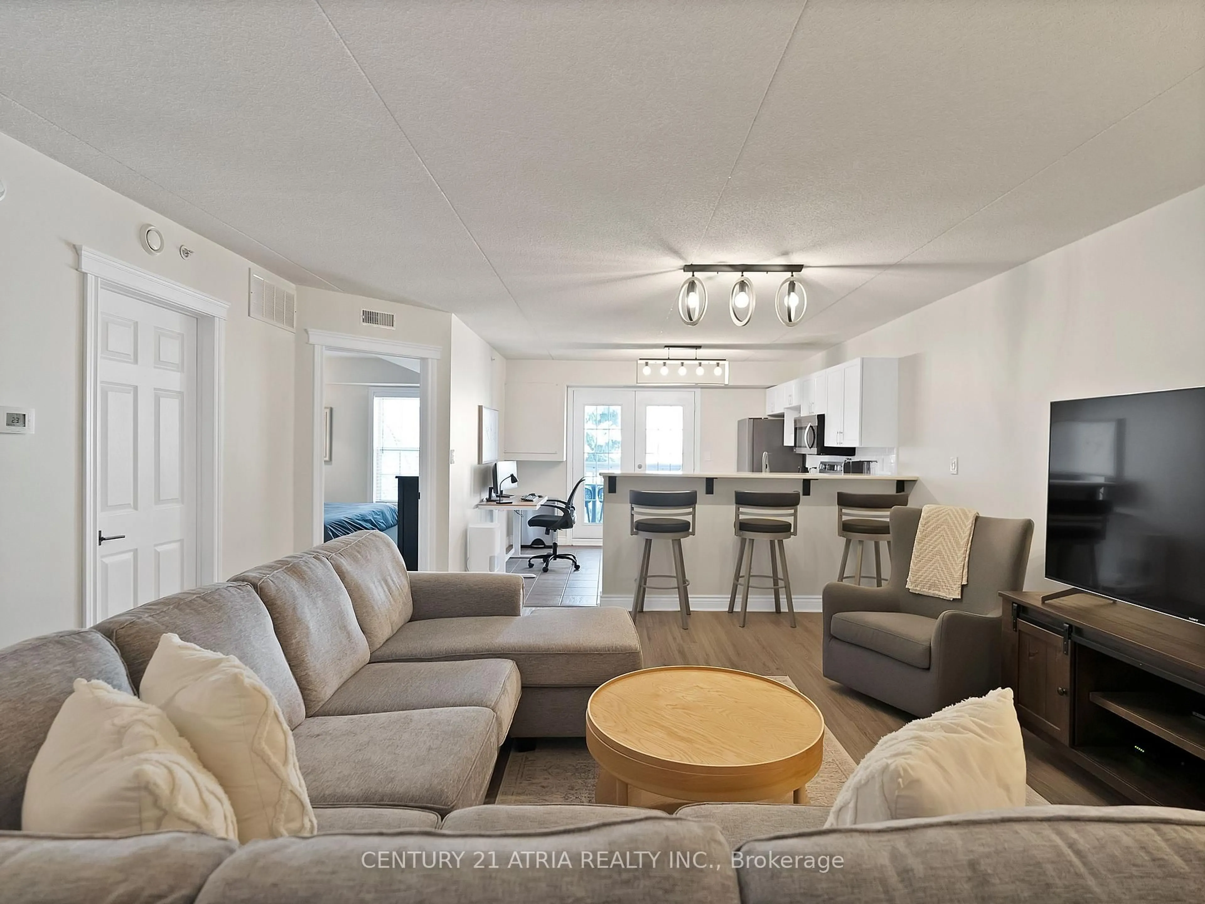 Living room with furniture, unknown for 4015 Kilmer Dr #305, Burlington Ontario L7M 4M4