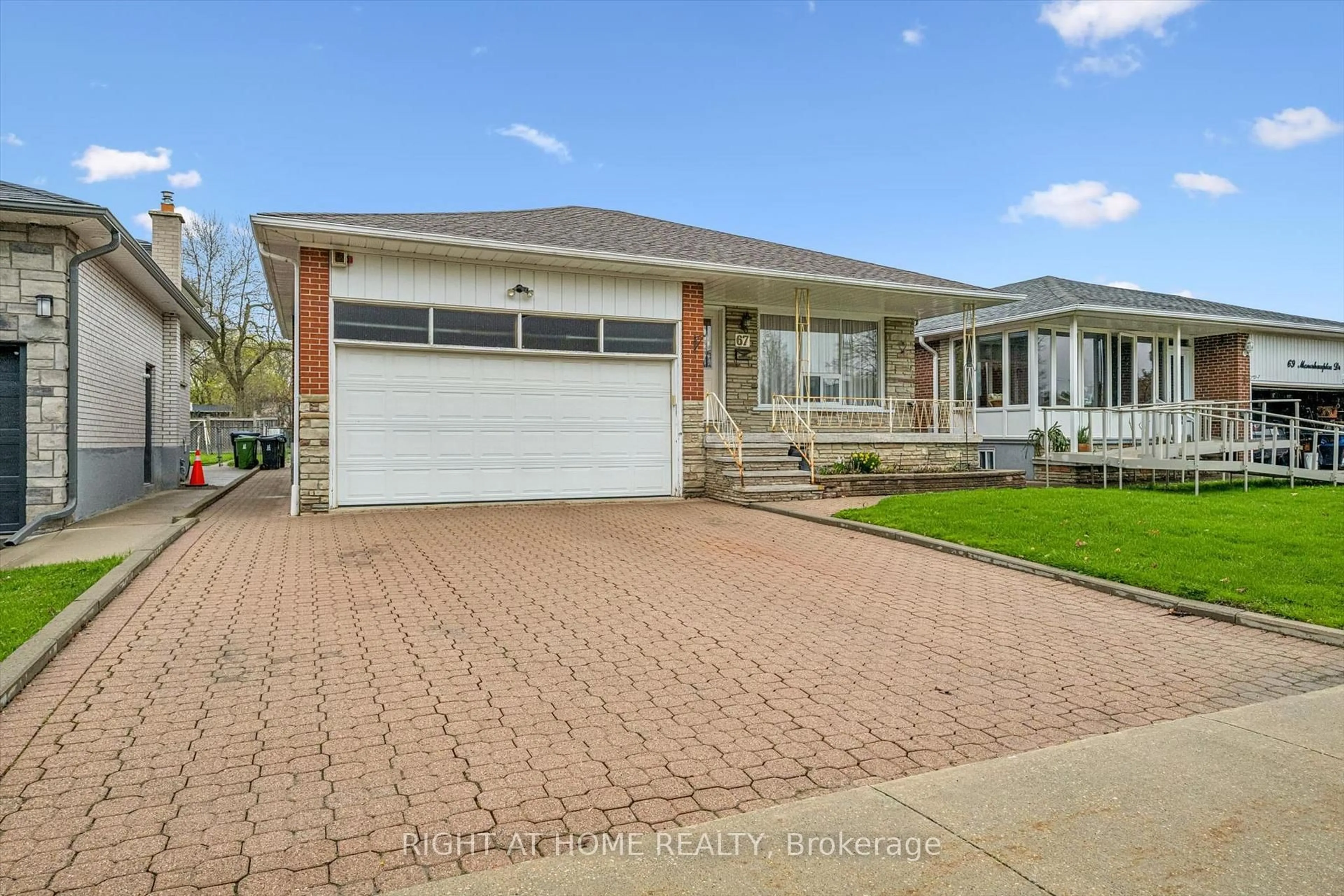 Home with brick exterior material, street for 67 Manorhampton Dr, Toronto Ontario M9P 1E1