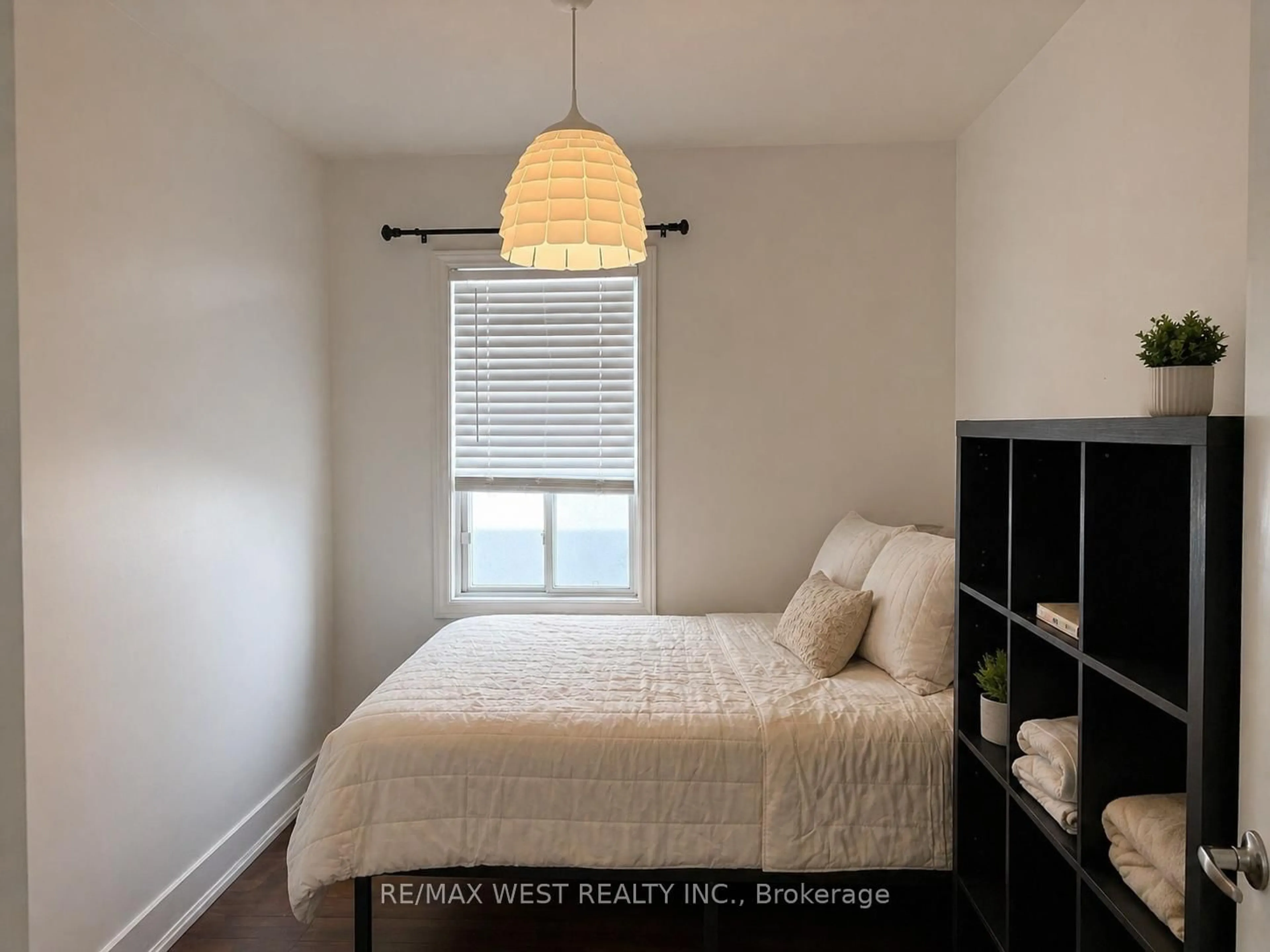 Bedroom with bed, wood/laminate floor for 270 Boon Ave, Toronto Ontario M6E 3Z9