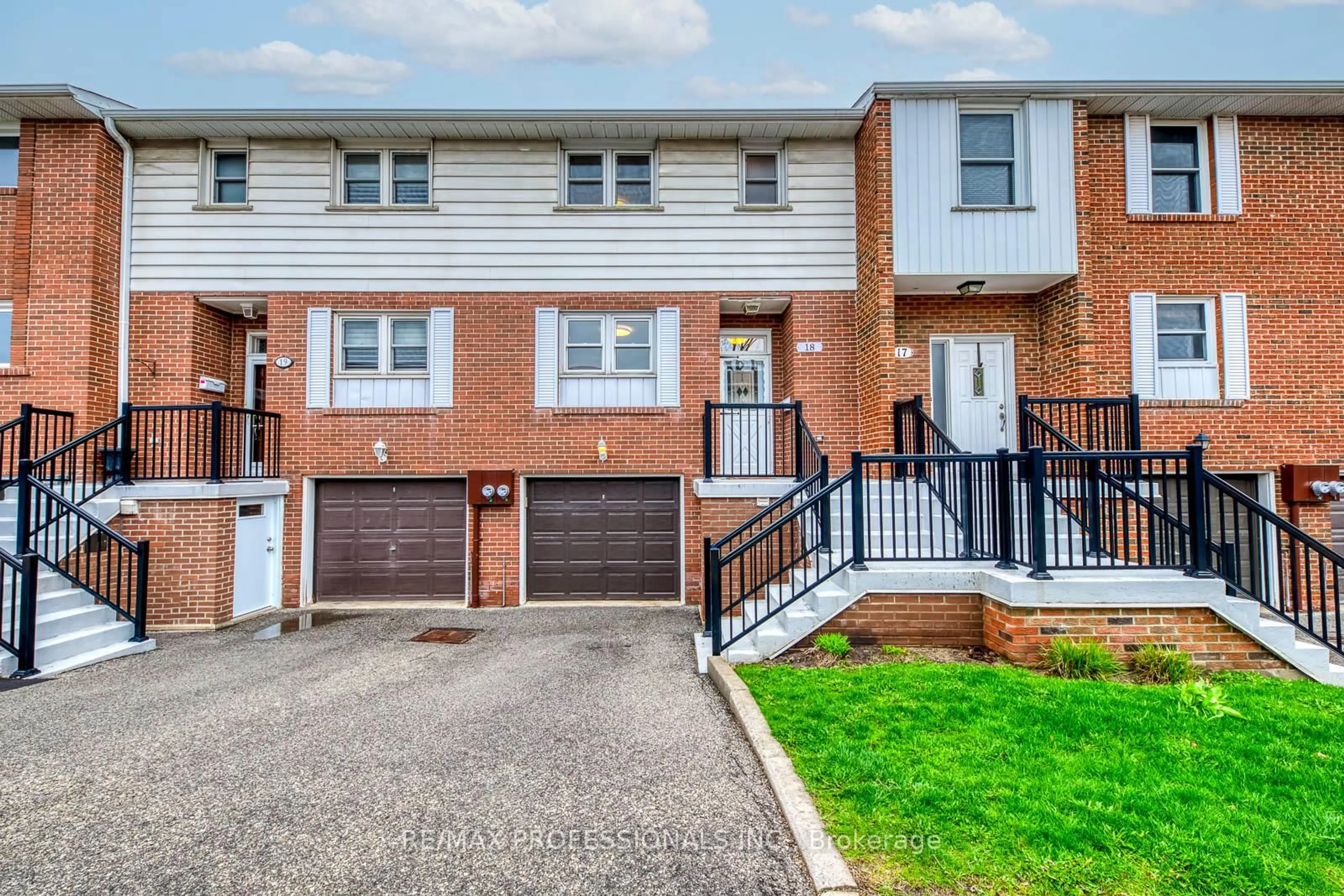 Home with brick exterior material, street for 17 Centennial Park Rd #18, Toronto Ontario M9C 4W8