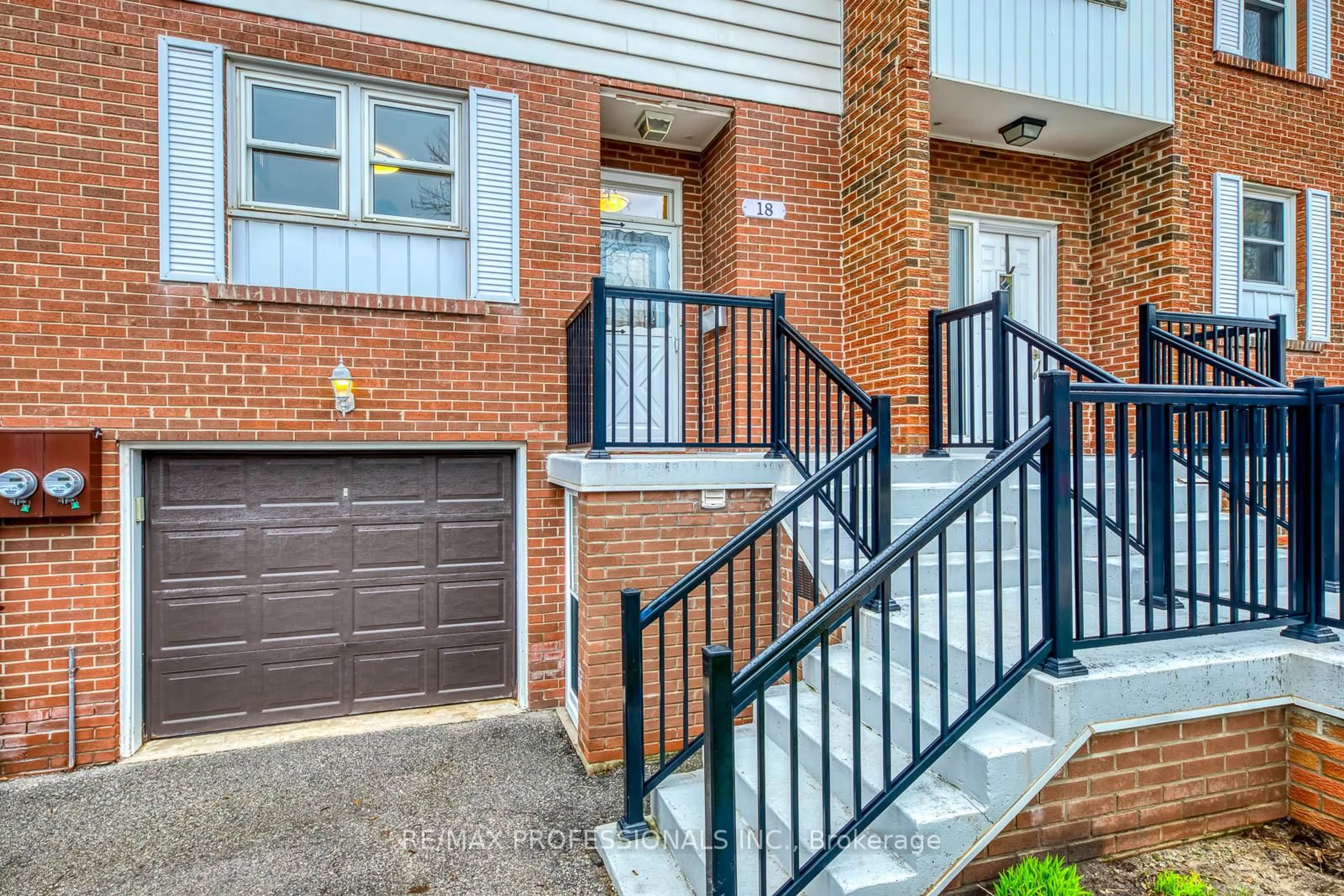 Home with brick exterior material, street for 17 Centennial Park Rd #18, Toronto Ontario M9C 4W8