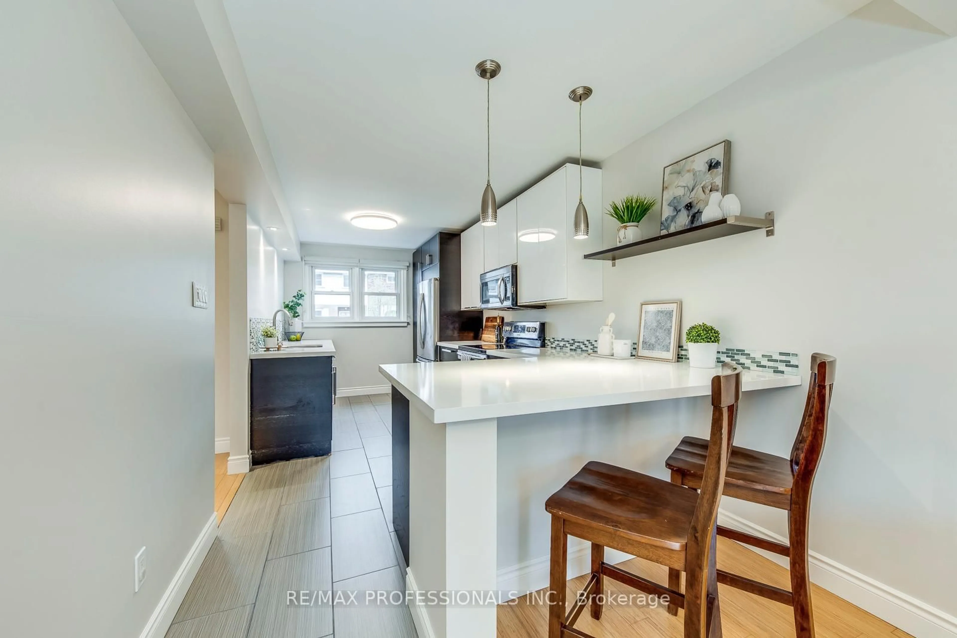 Open concept kitchen, unknown for 17 Centennial Park Rd #18, Toronto Ontario M9C 4W8