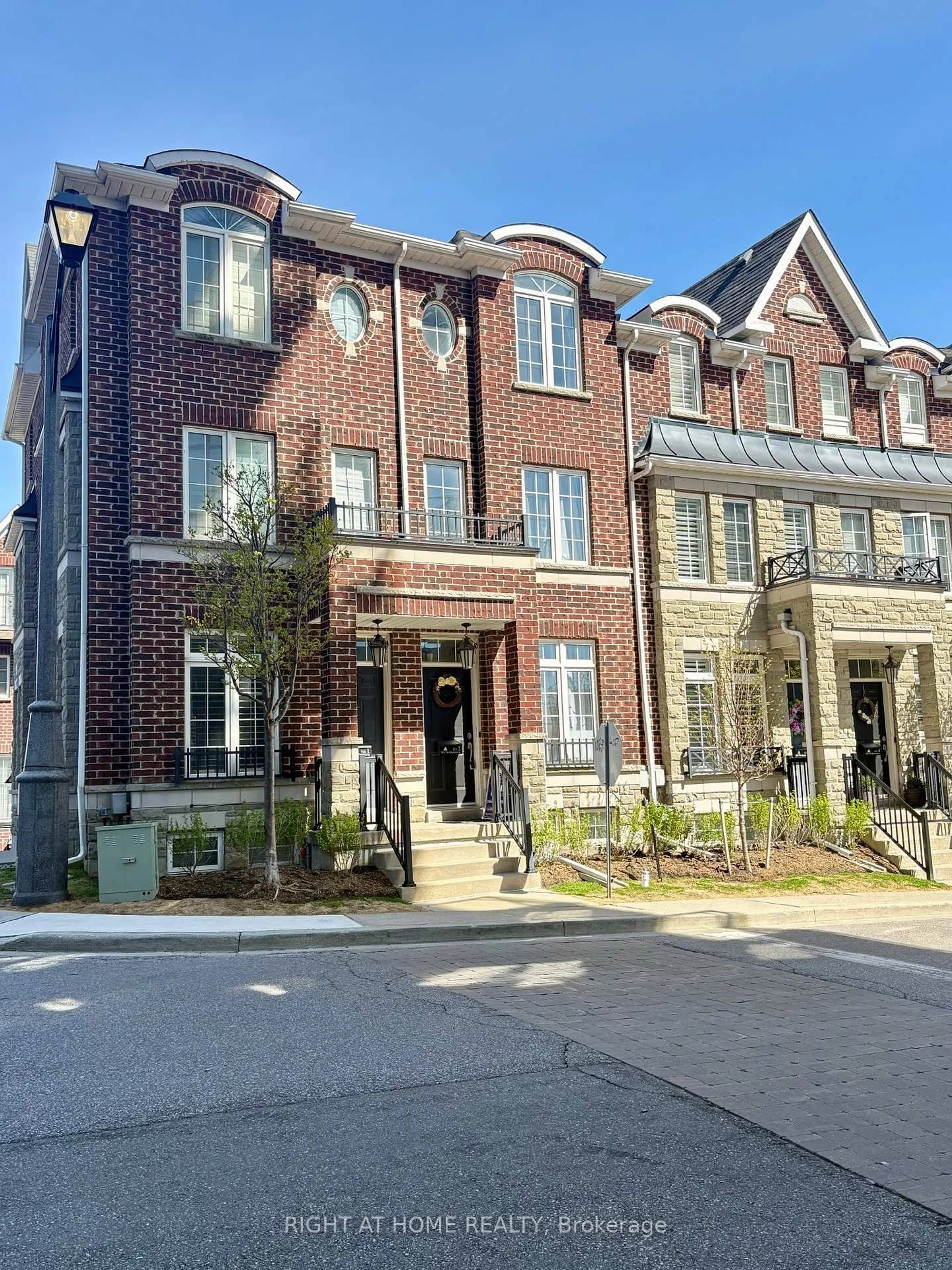 Home with brick exterior material, street for 101 The Queensway #TH 2, Toronto Ontario M8Z 0H1