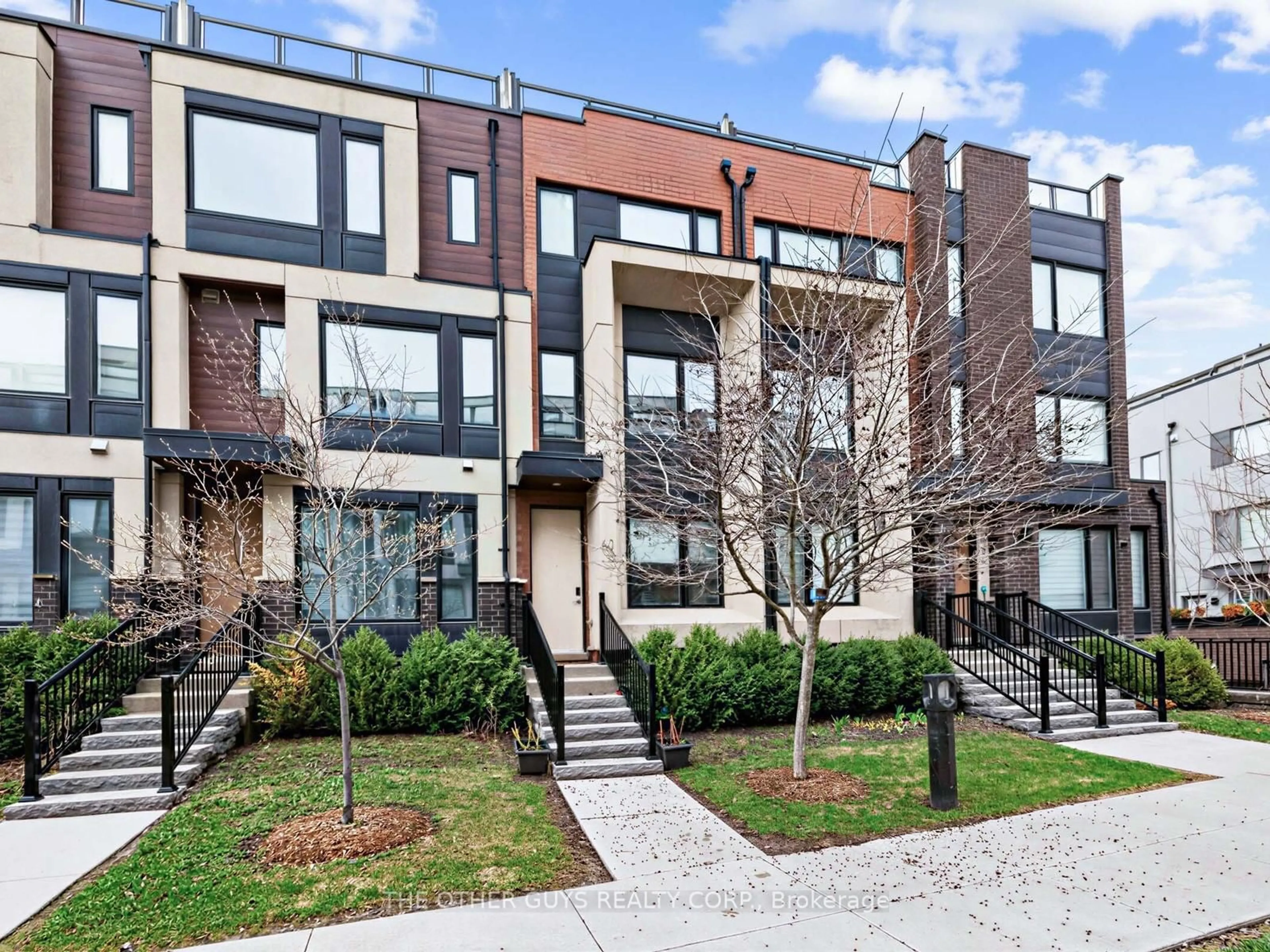 Home with brick exterior material, street for 60 Thomas Mulholland Dr #3, Toronto Ontario M3K 0A6