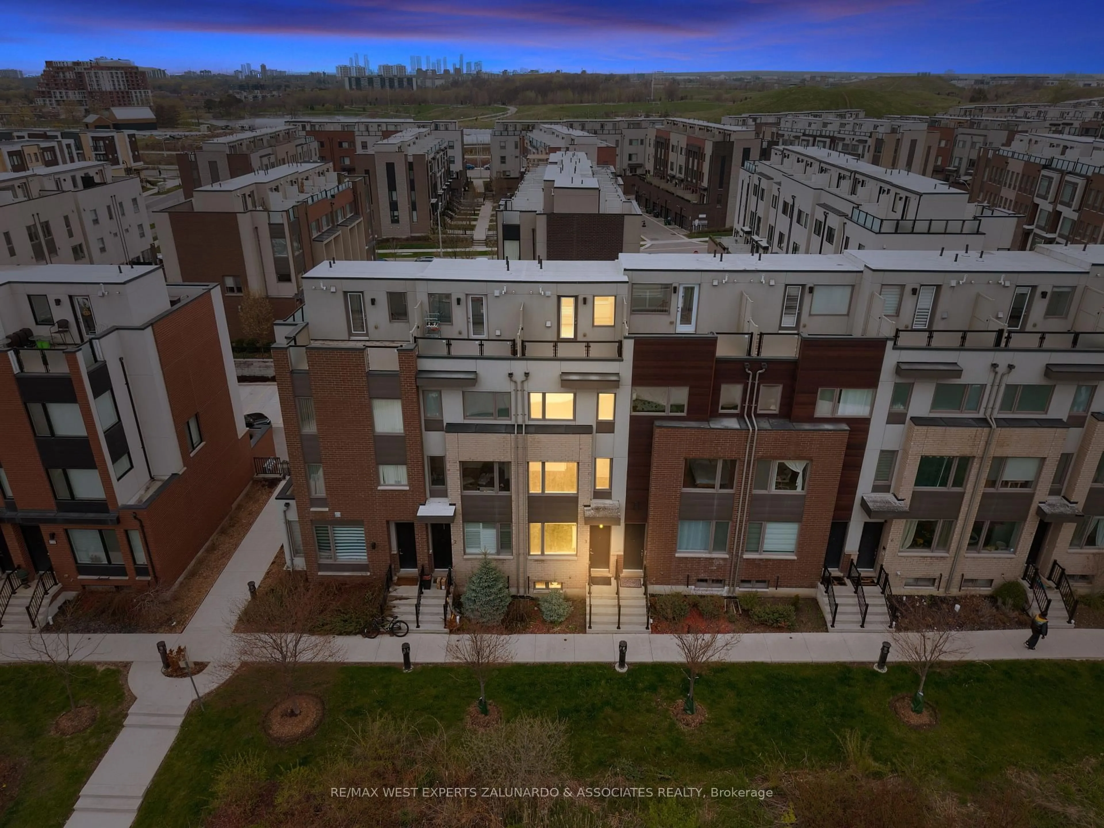 A pic from outside/outdoor area/front of a property/back of a property/a pic from drone, city buildings view from balcony for 120 Frederick Tisdale Dr #3, Toronto Ontario M3K 0A8