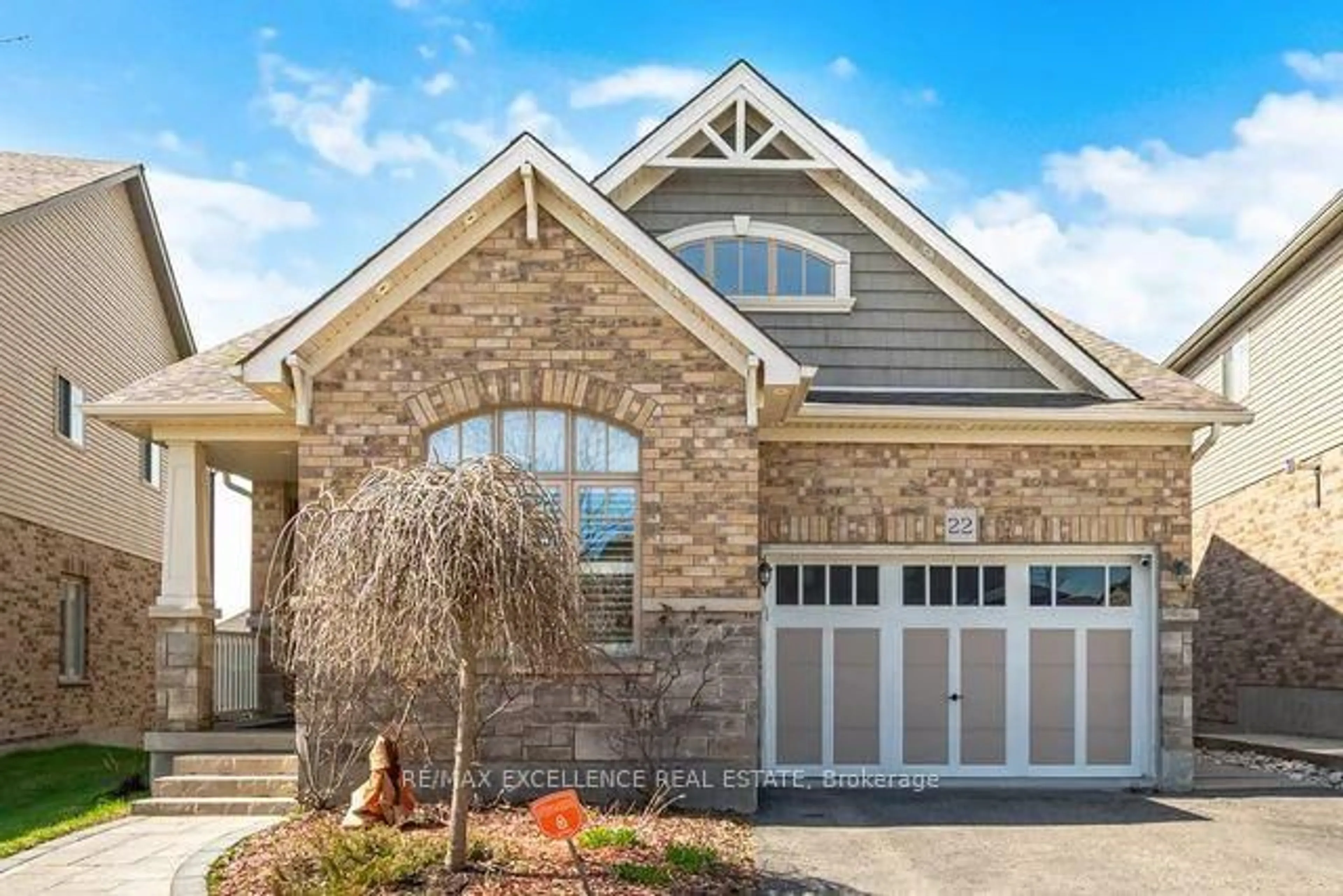 Home with brick exterior material, street for 22 Wardlaw Ave, Orangeville Ontario L9W 6K1