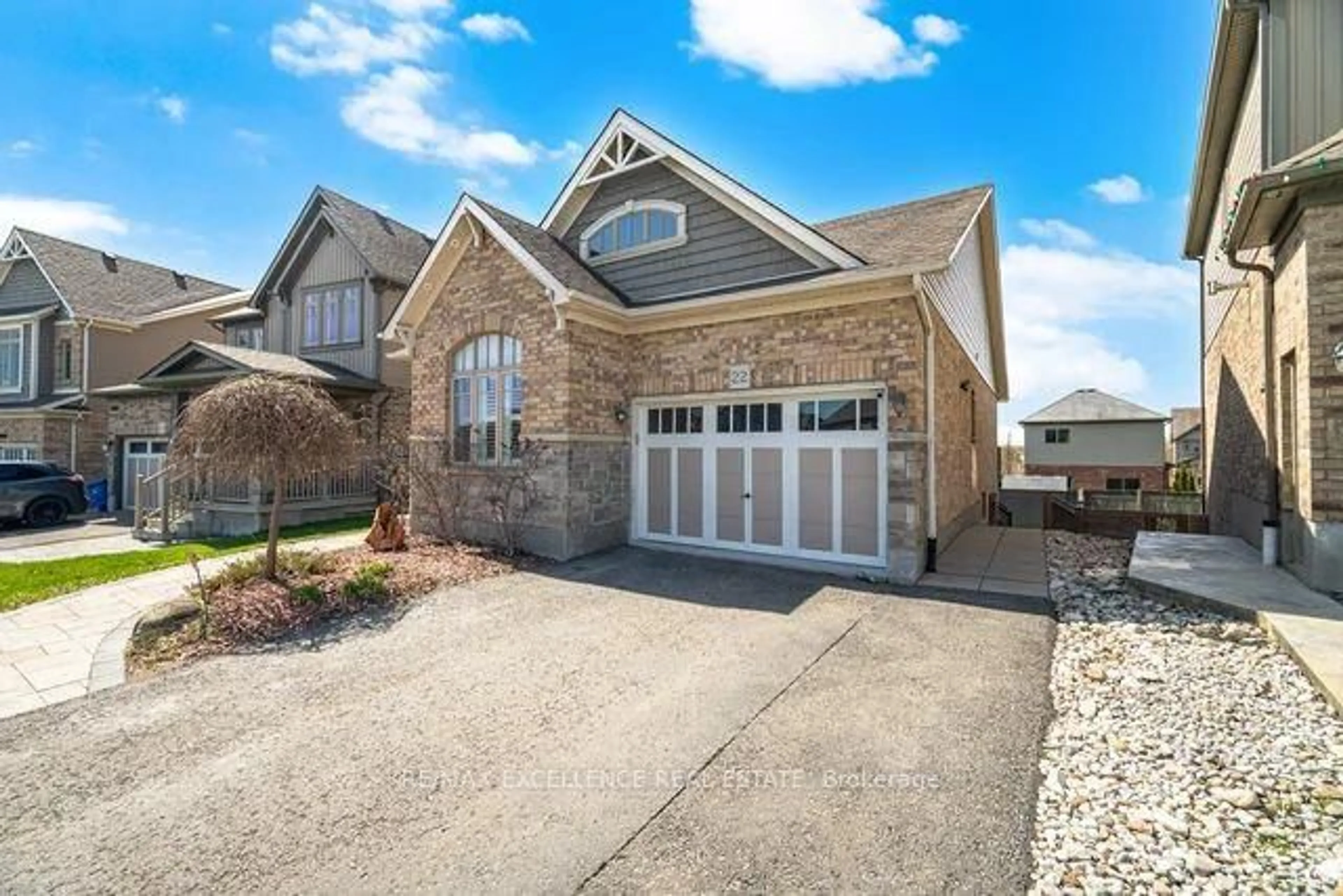 Home with brick exterior material, street for 22 Wardlaw Ave, Orangeville Ontario L9W 6K1