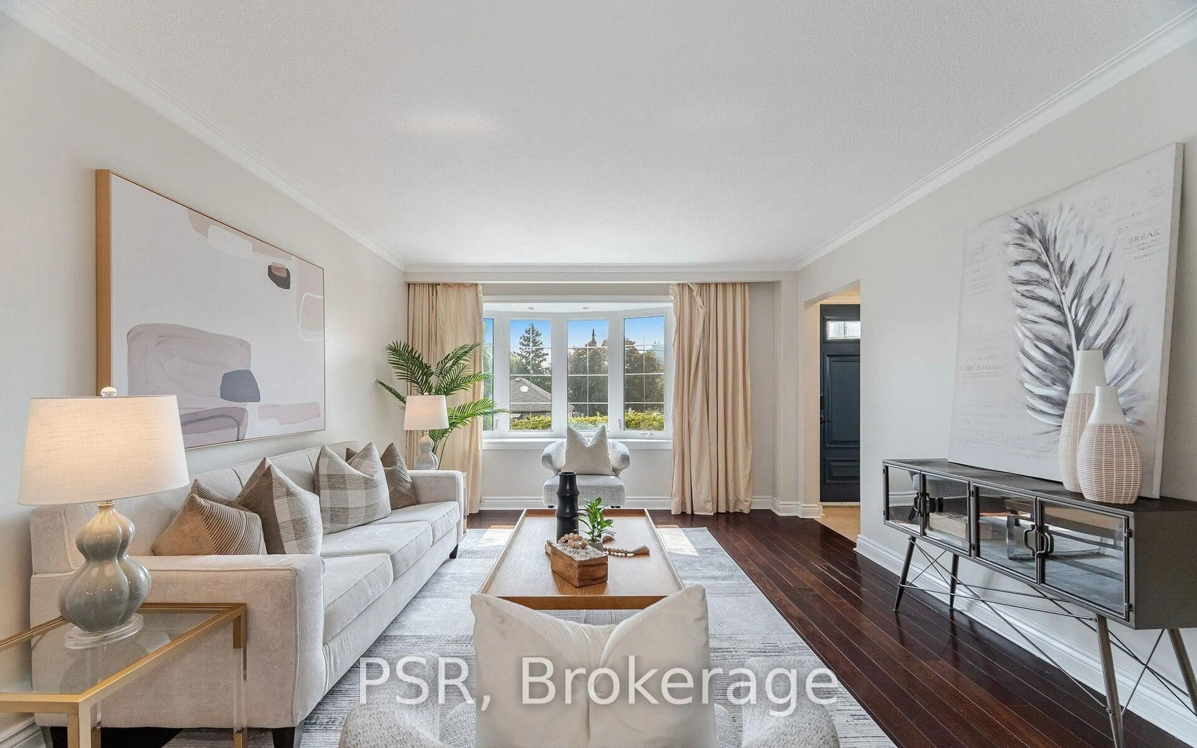 Living room with furniture, wood/laminate floor for 57 Stephen Dr, Toronto Ontario M8Y 3M8