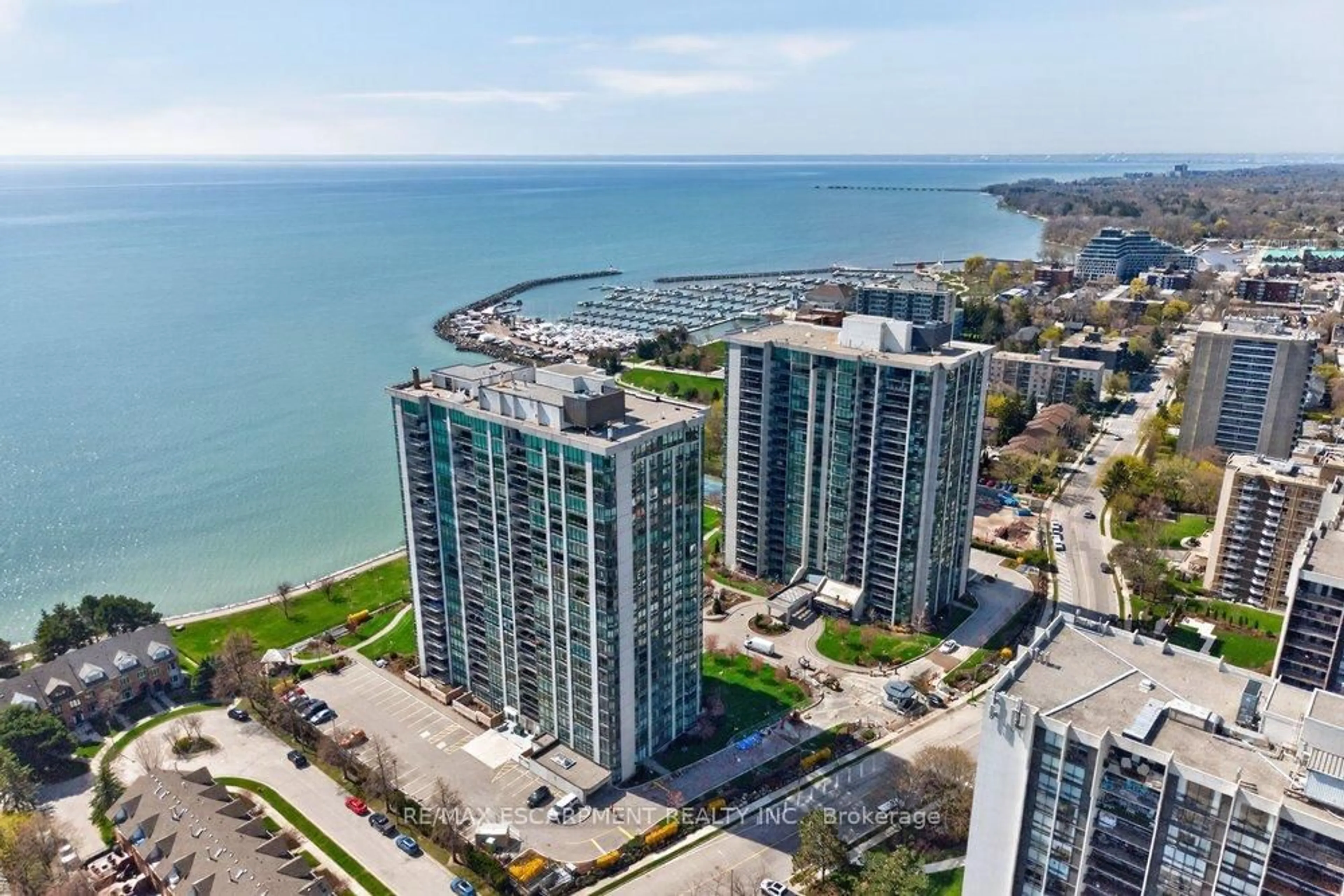 A pic from outside/outdoor area/front of a property/back of a property/a pic from drone, water/lake/river/ocean view for 2170 Marine Dr #1001, Oakville Ontario L6L 5V1