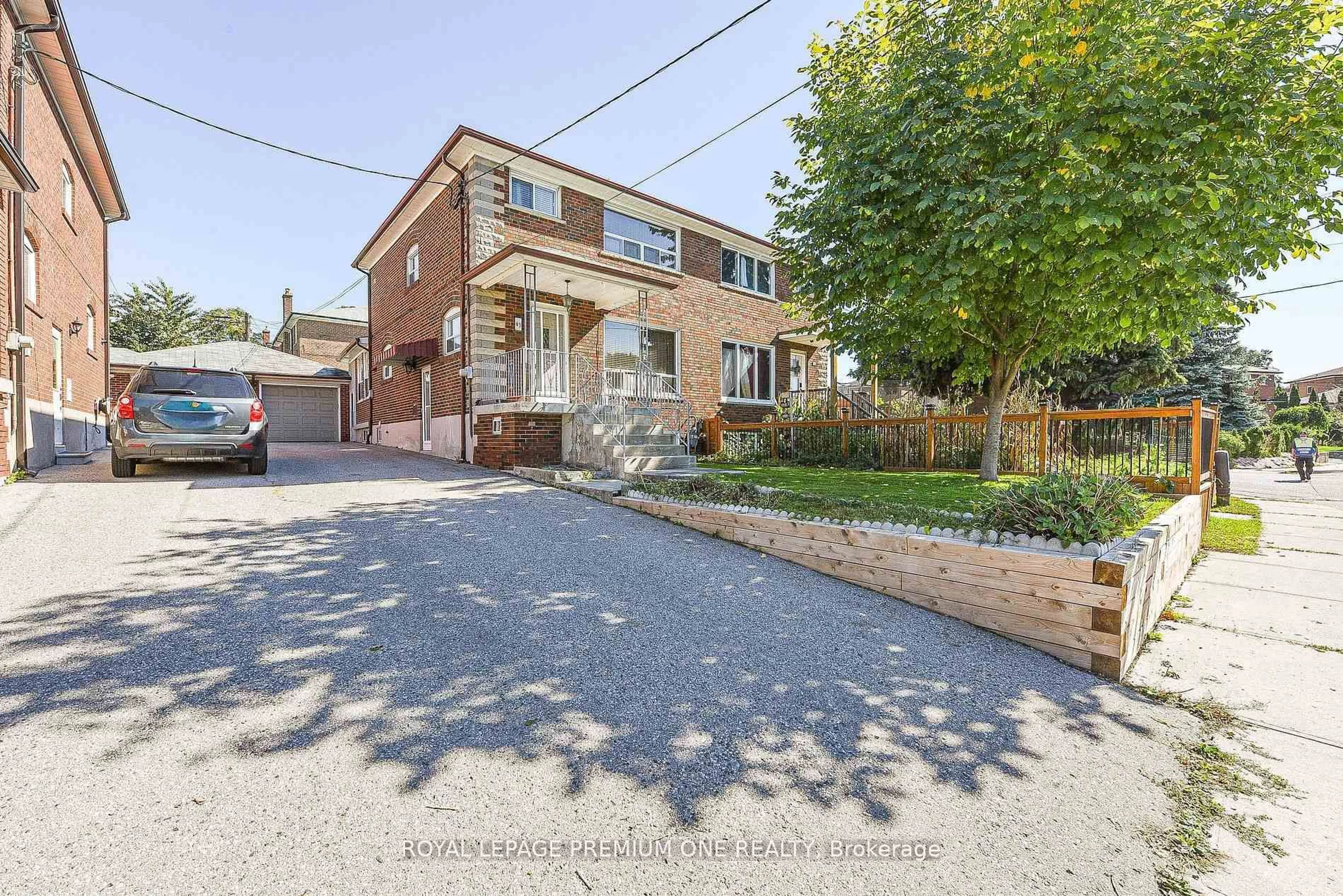 Home with brick exterior material, street for 63 Haverson Blvd, Toronto Ontario M6M 3J8