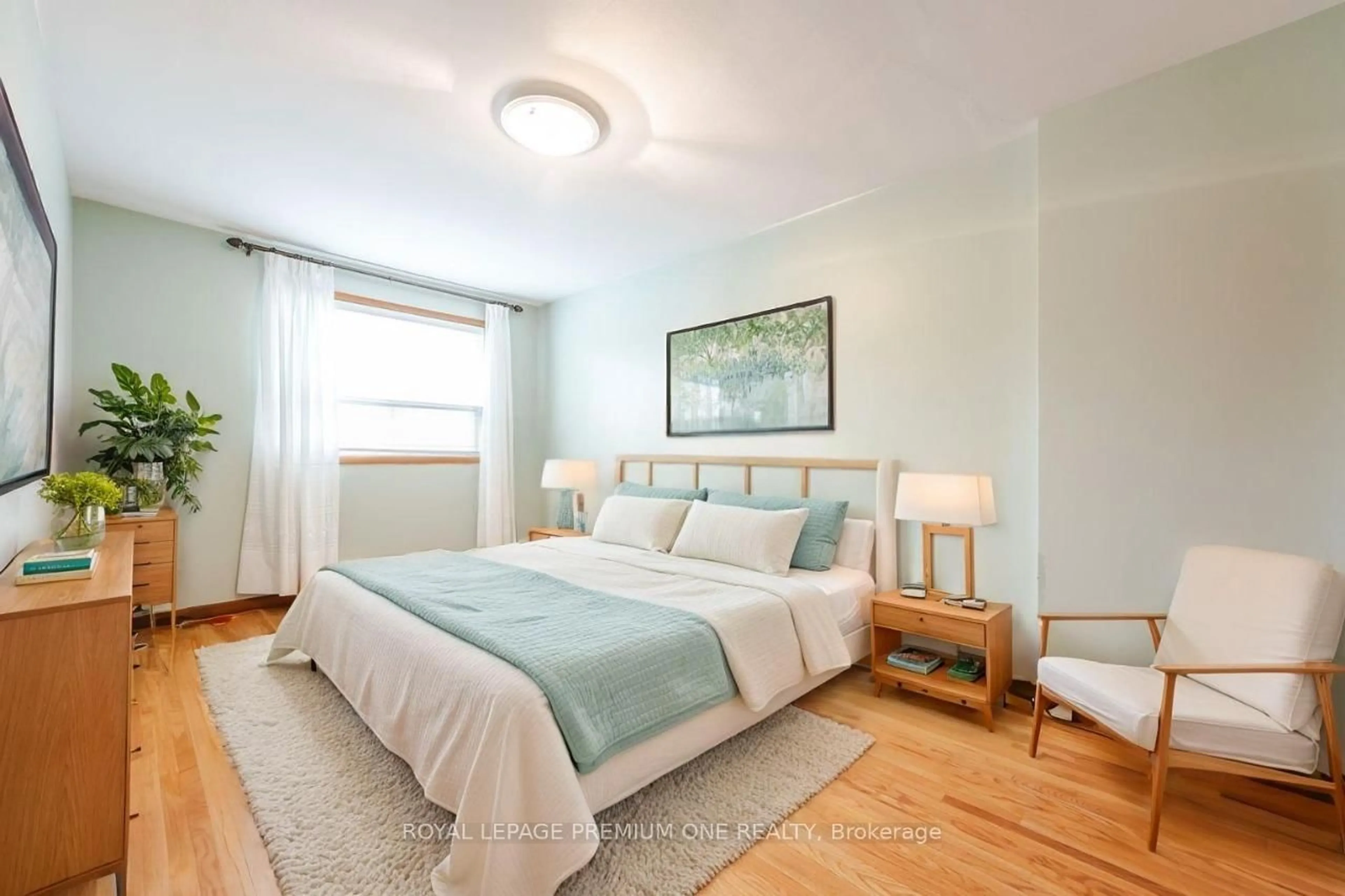 Bedroom with bed, wood/laminate floor for 63 Haverson Blvd, Toronto Ontario M6M 3J8