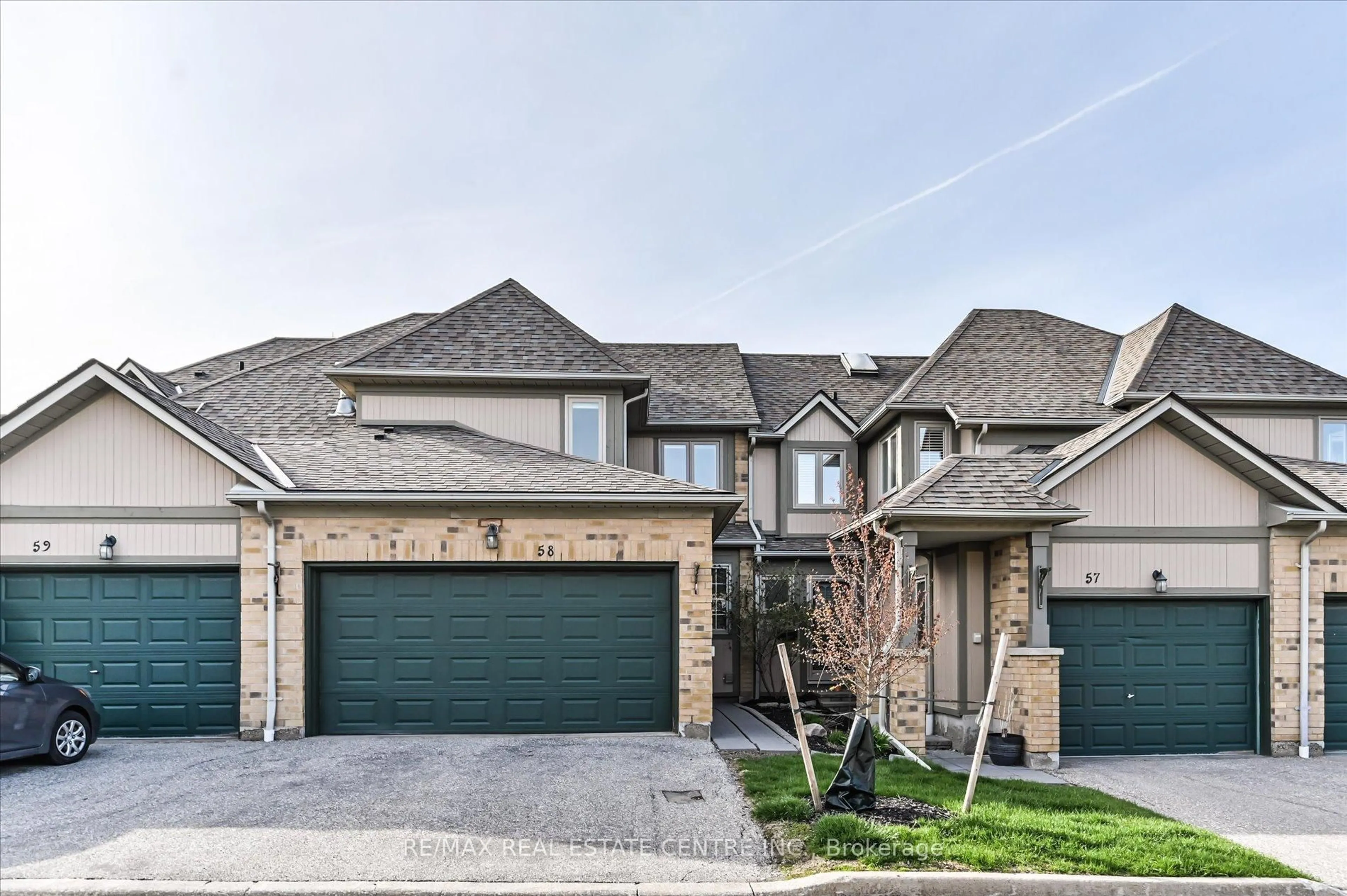 Home with brick exterior material, street for 5662 Glen Erin Dr #58, Mississauga Ontario L5M 6C4