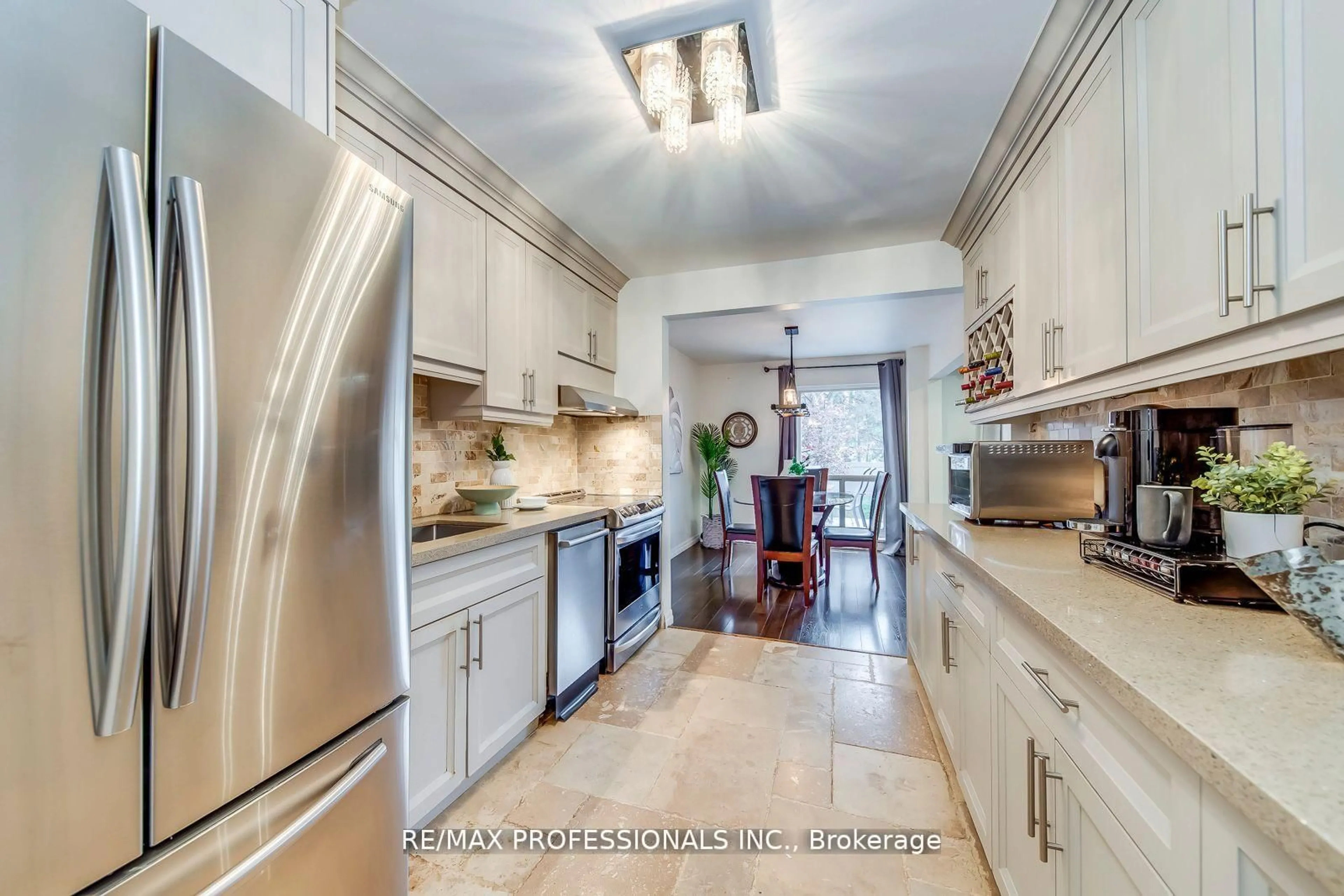 Open concept kitchen, ceramic/tile floor for 4345 Bloor St #51, Toronto Ontario M9C 2A4