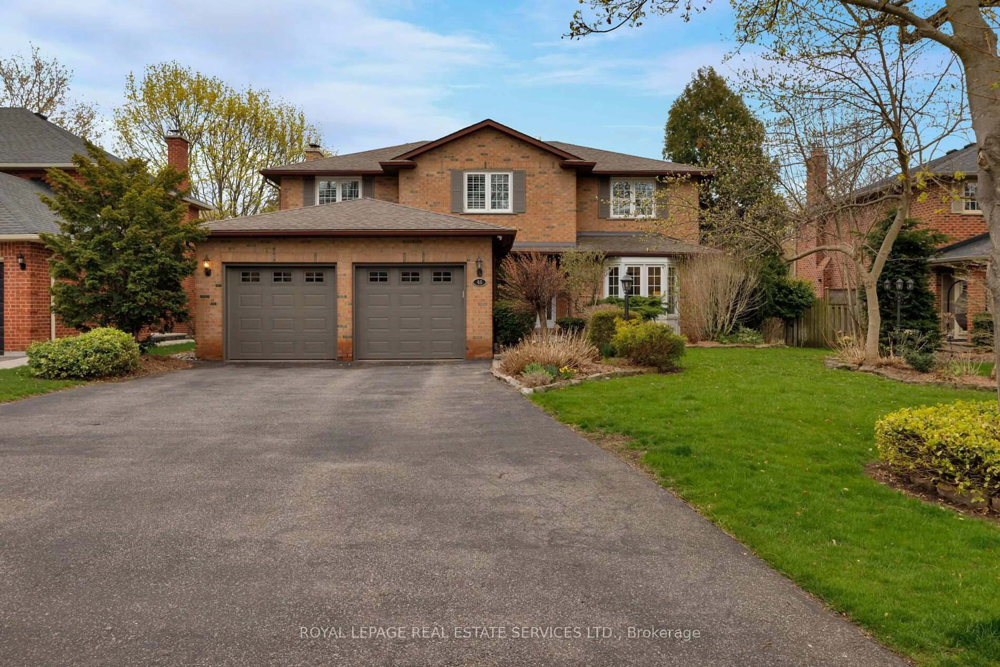 Home with brick exterior material, street for 48 Cudmore Rd, Oakville Ontario L6L 2Y5