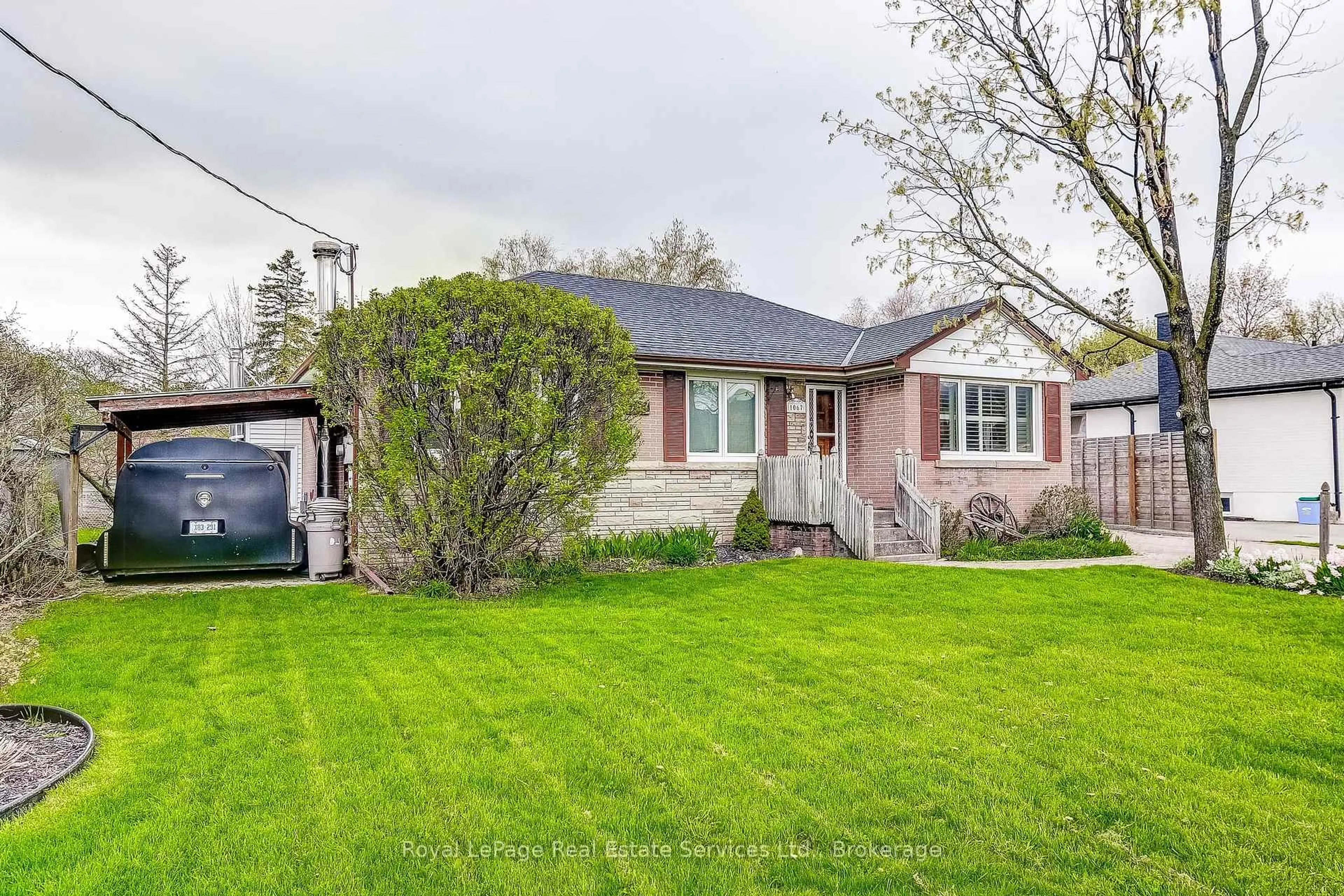 Home with brick exterior material, street for 1067 Pinegrove Rd, Oakville Ontario L6L 2W3