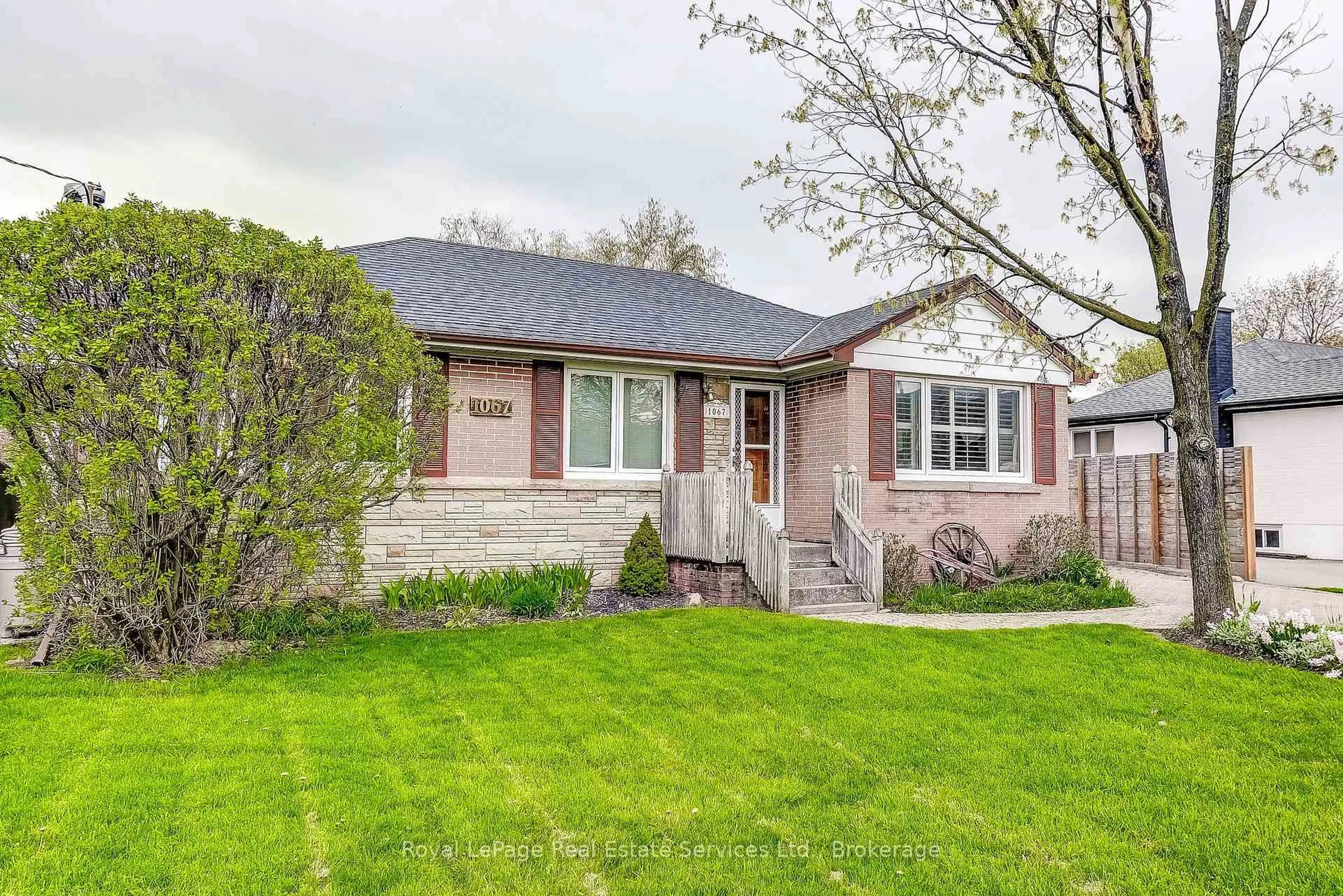 Home with brick exterior material, street for 1067 Pinegrove Rd, Oakville Ontario L6L 2W3