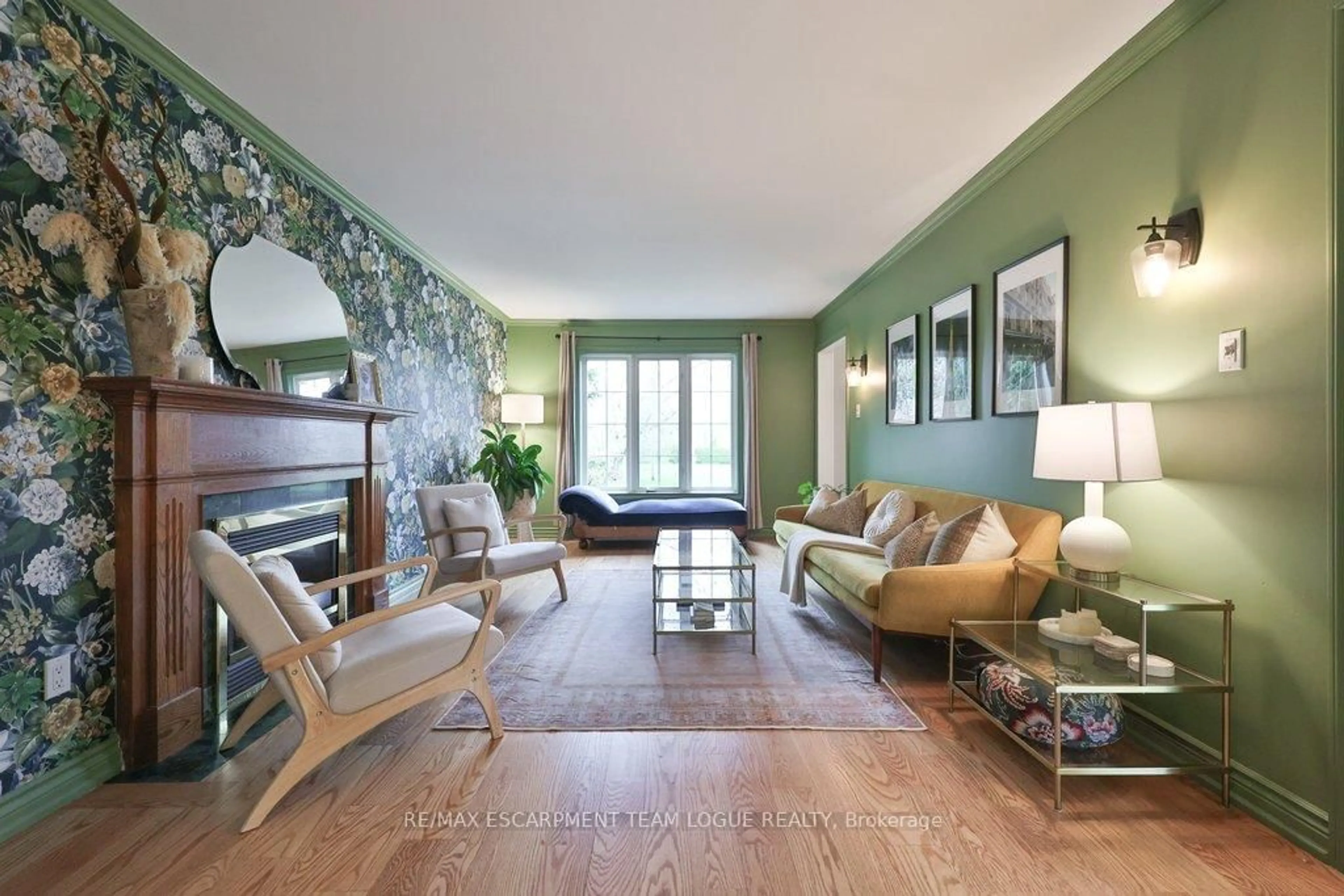 Living room with furniture, wood/laminate floor for 690 Lambshead Dr, Burlington Ontario L7S 2J5