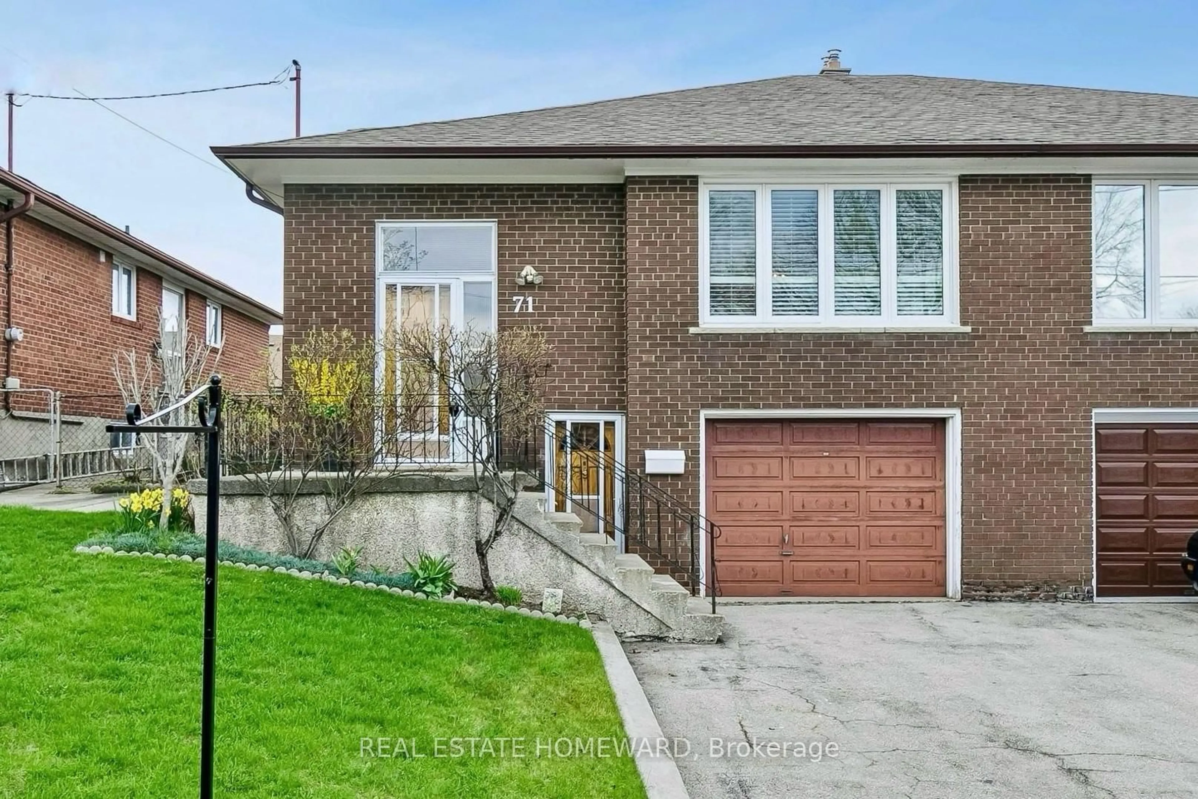 Home with brick exterior material, street for 71 Thwaite Ave, Toronto Ontario M3L 2C8