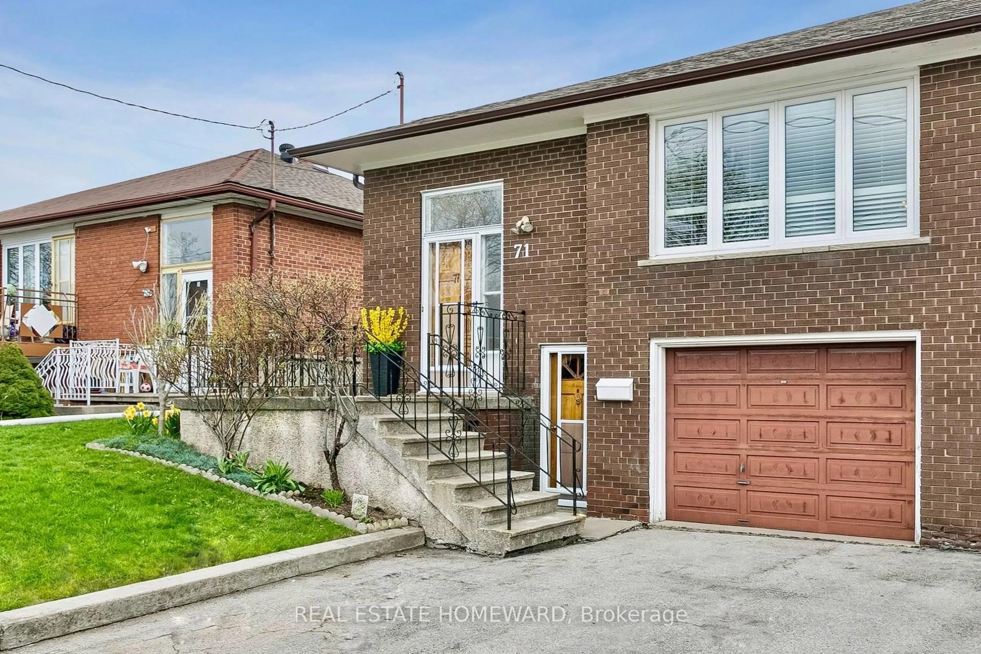 Home with brick exterior material, street for 71 Thwaite Ave, Toronto Ontario M3L 2C8