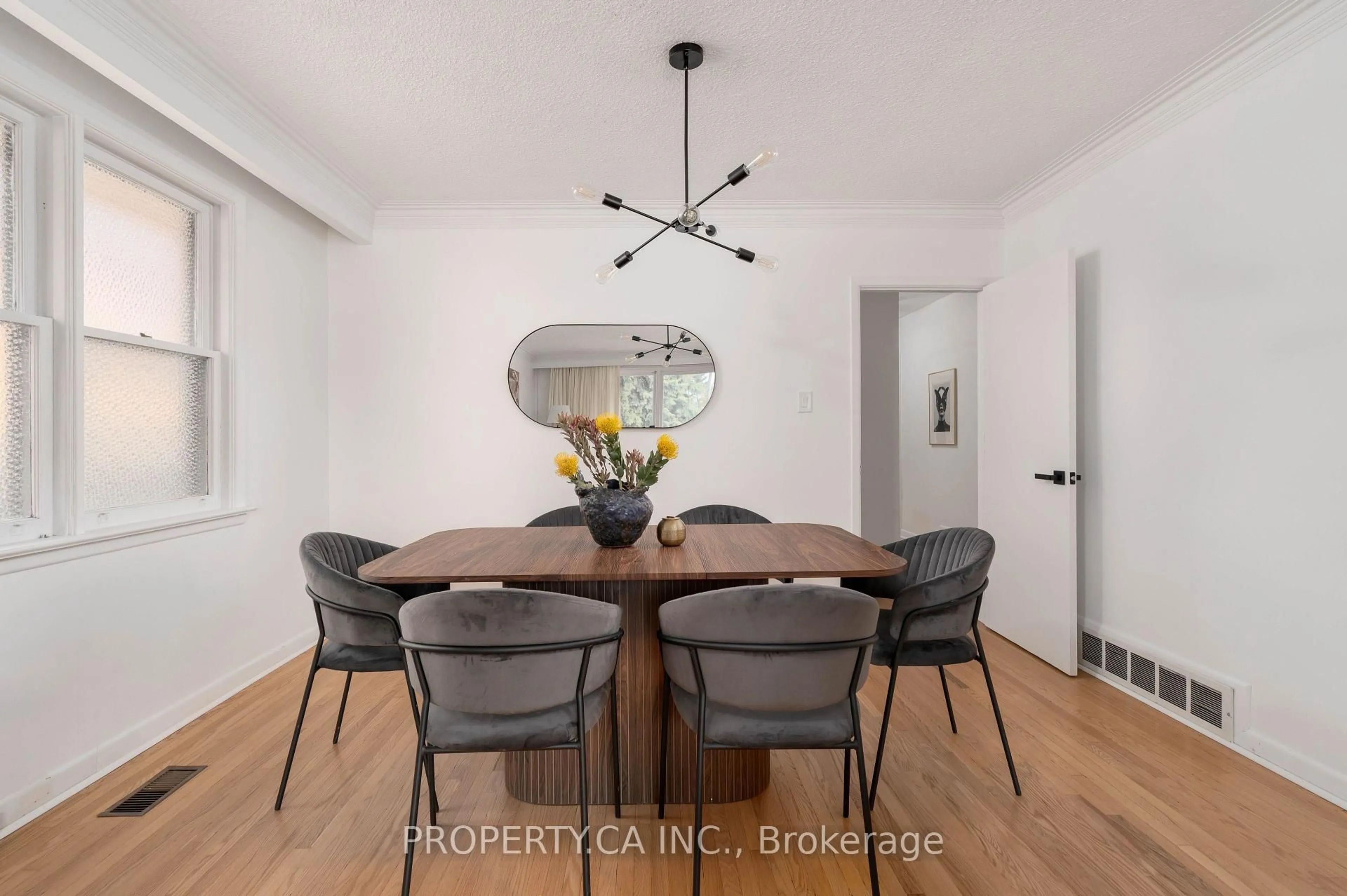 Dining room, wood/laminate floor for 19 Jill Cres, Toronto Ontario M9B 6B2