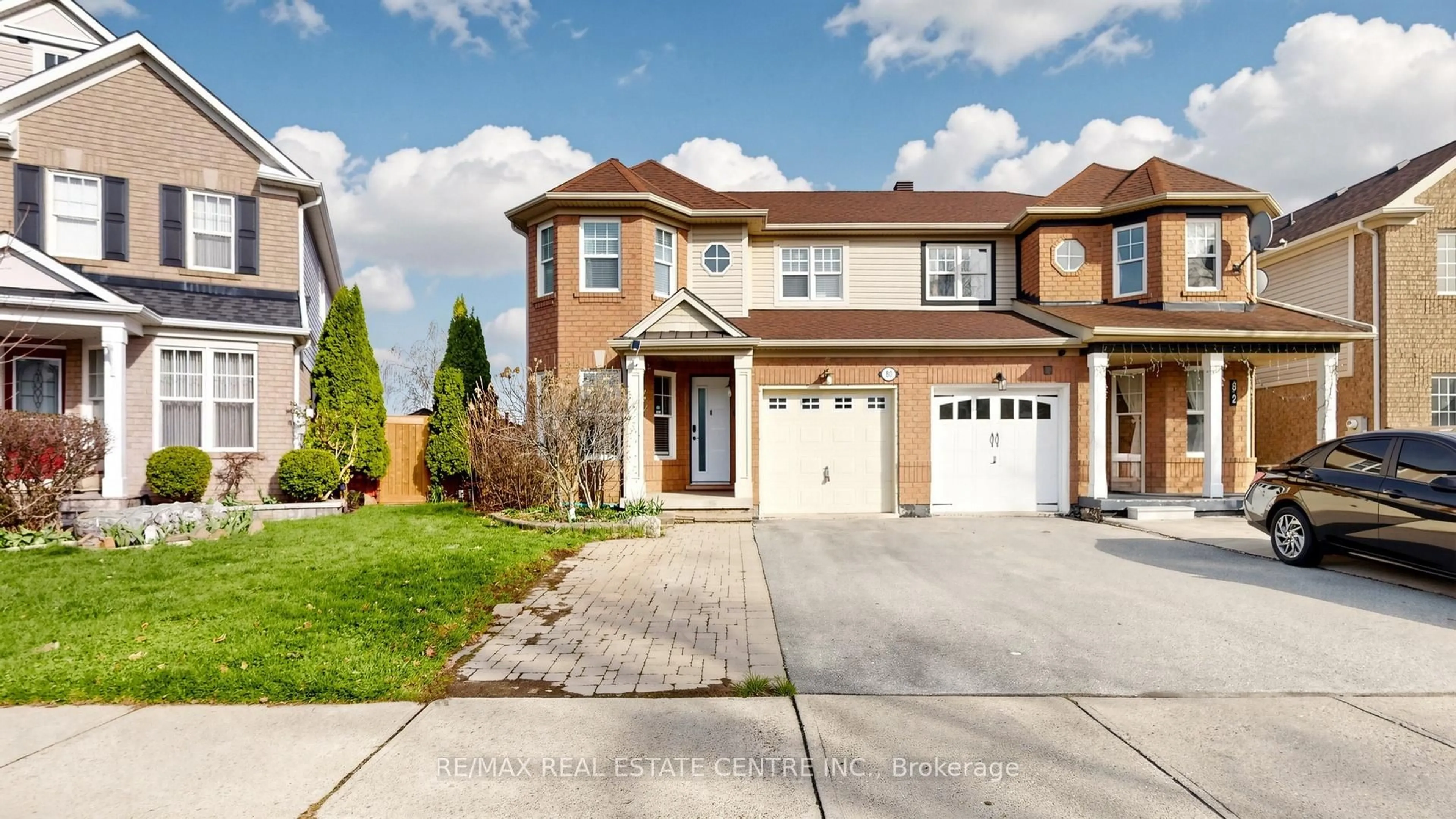 Home with brick exterior material, street for 80 Sweetwood Circ, Brampton Ontario L7A 2S1
