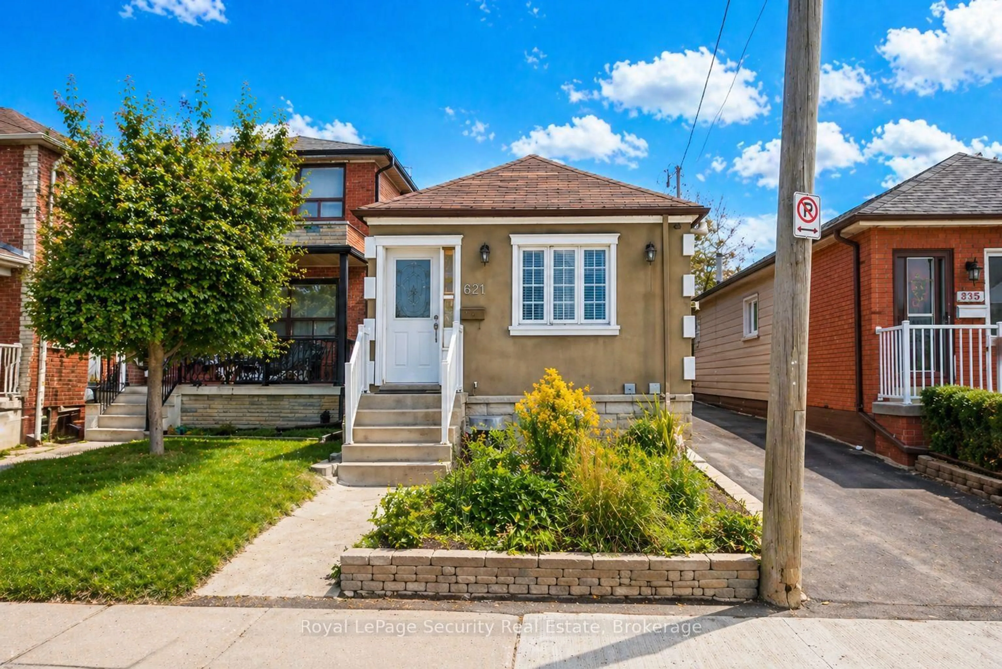 Home with brick exterior material, street for 627 Caledonia Rd, Toronto Ontario M6E 4V7