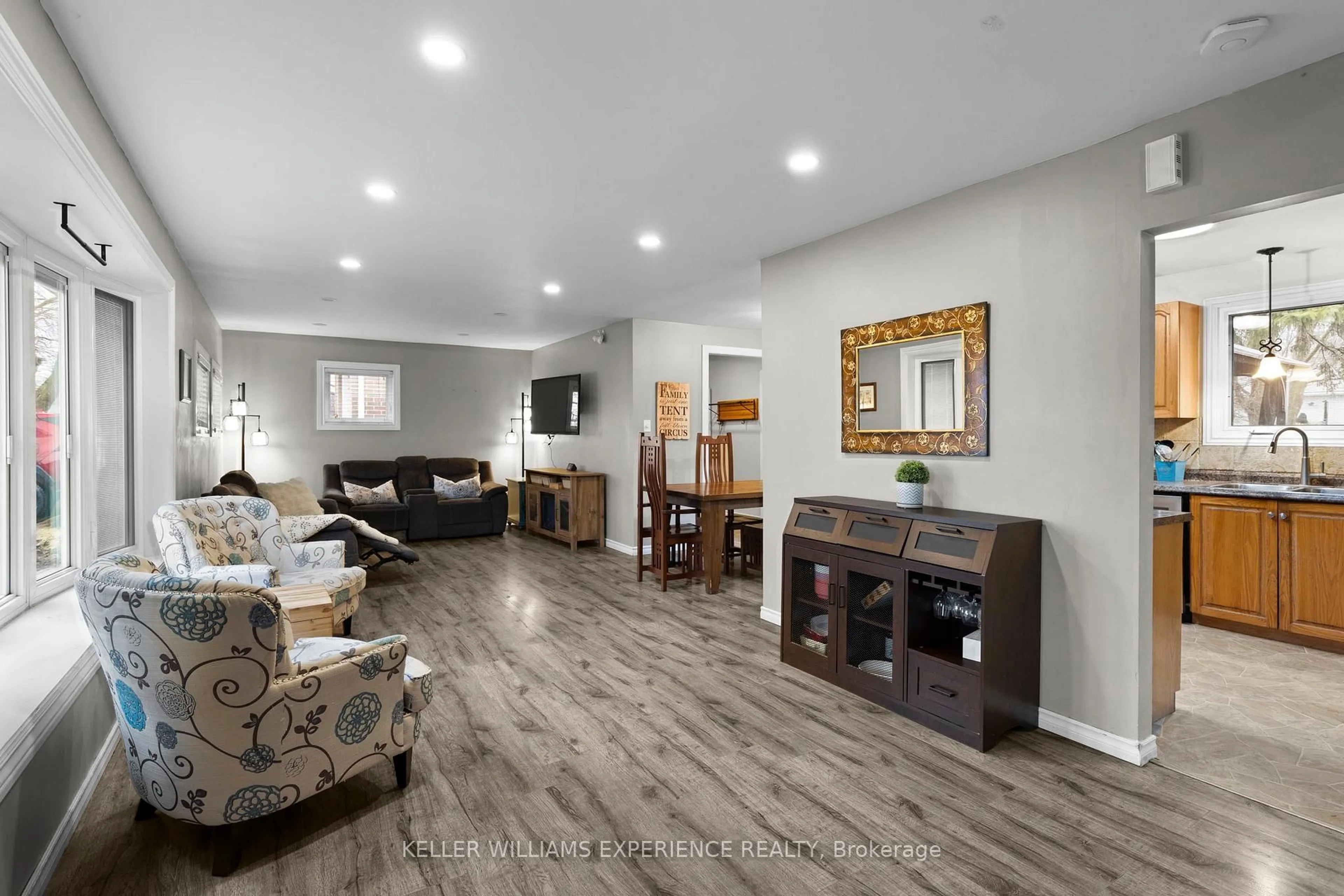 Living room with furniture, wood/laminate floor for 27 Rustic Cres, Orangeville Ontario L9W 1T1