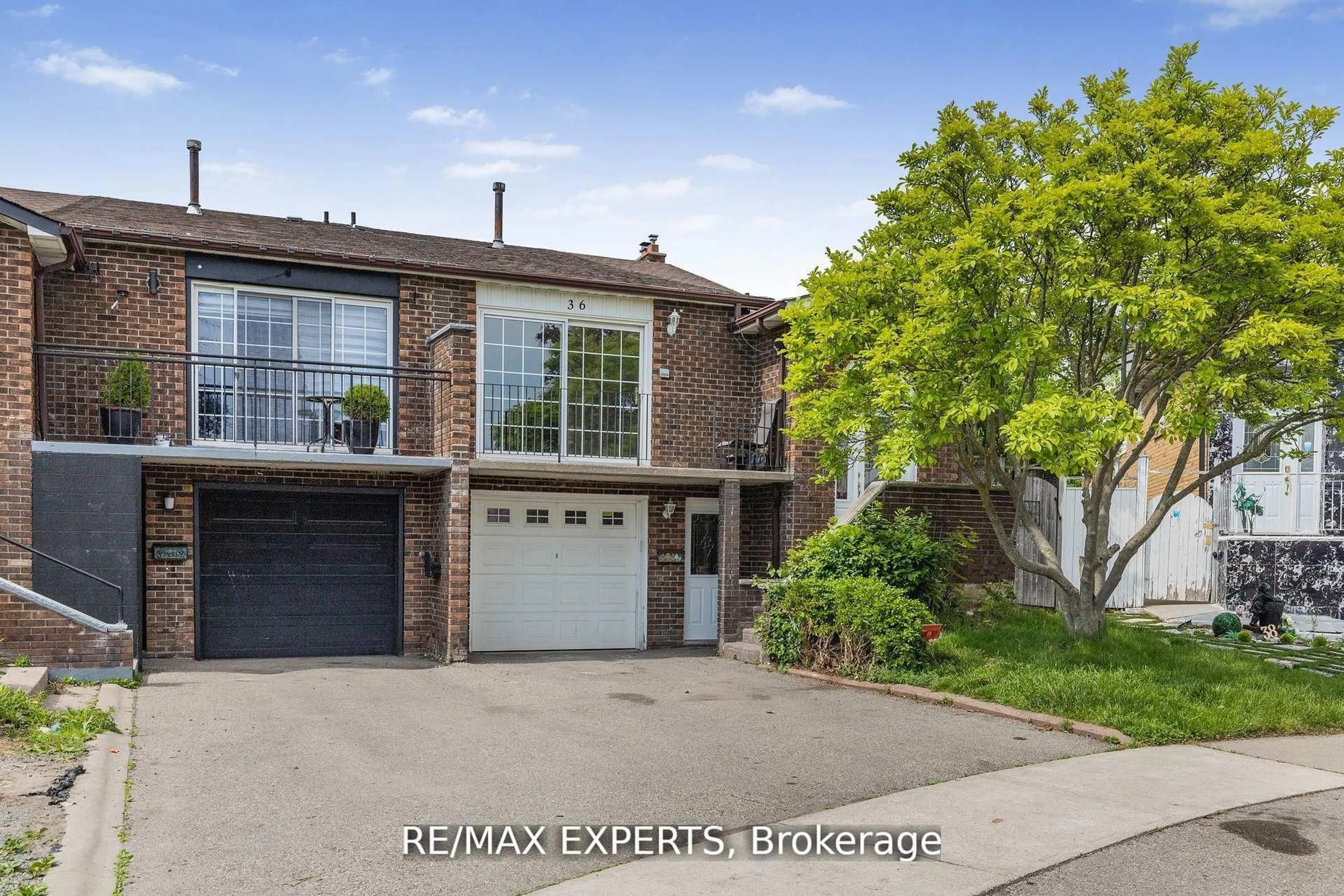 Home with brick exterior material, street for 36 Elderwood Pl, Brampton Ontario L6V 3N3