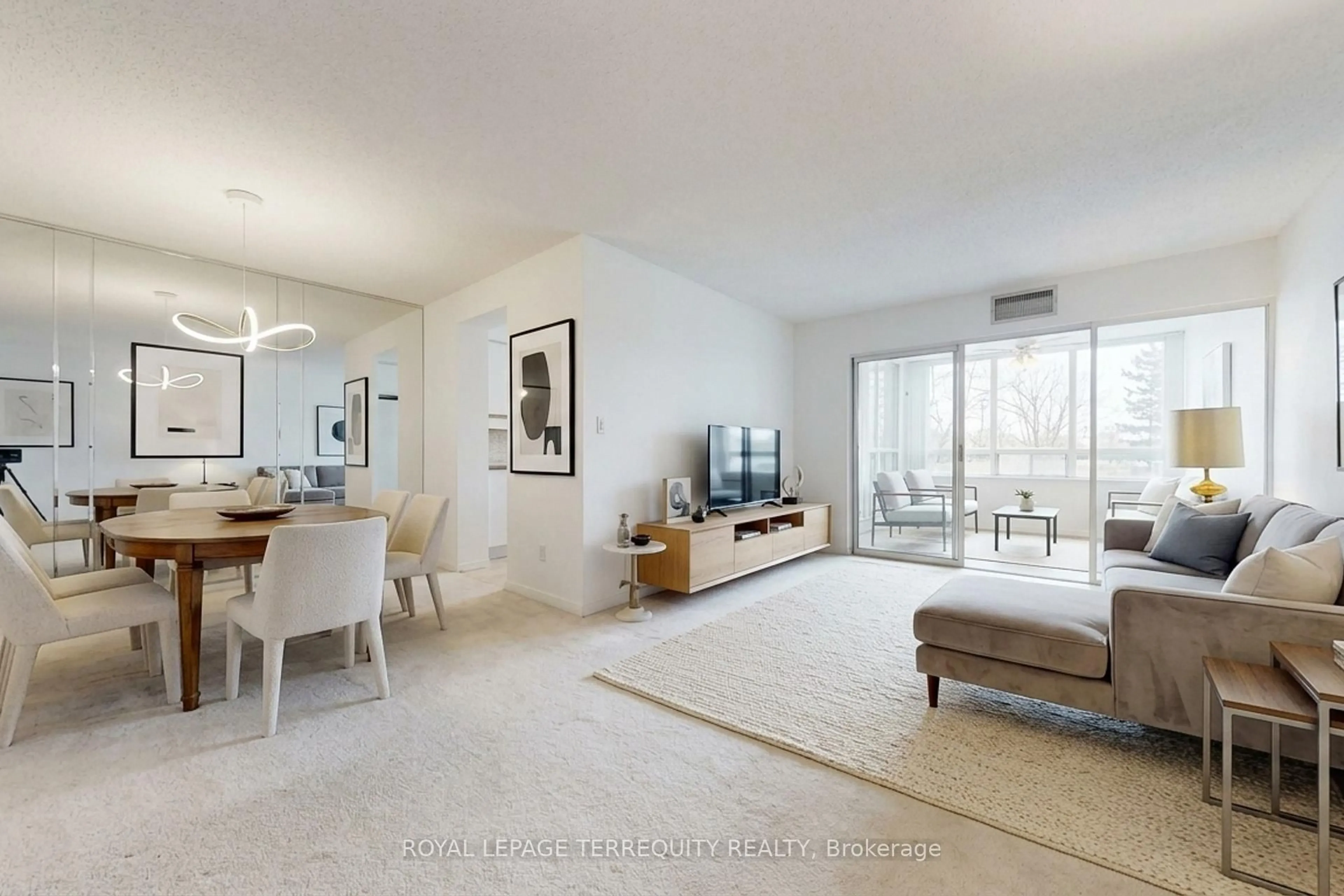 Living room with furniture, unknown for 20 Cherrytree Dr #211, Brampton Ontario L6Y 3V1