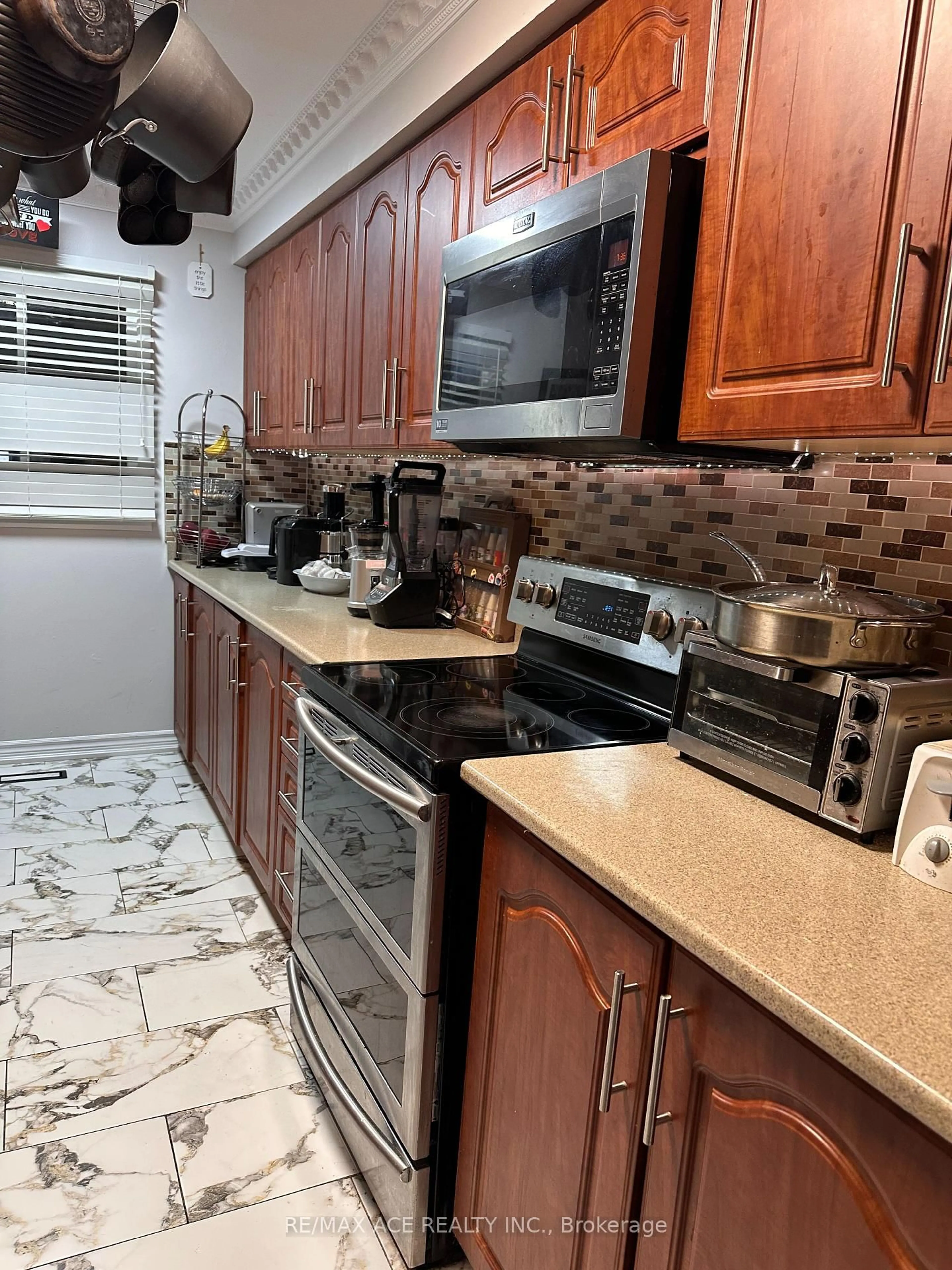 Standard kitchen, ceramic/tile floor for 247 Royal Salisbury Way, Brampton Ontario L6V 3G4