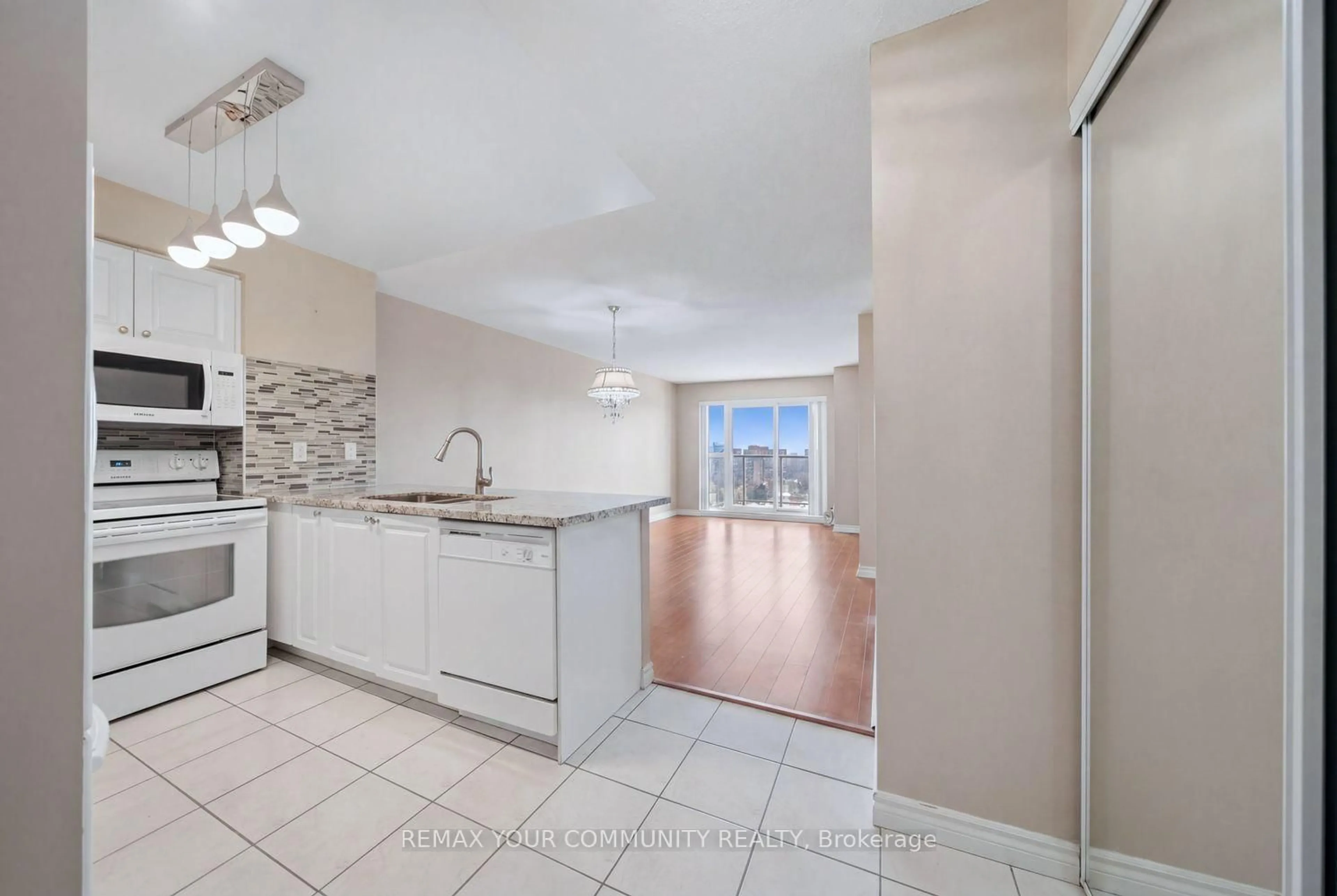 Open concept kitchen, unknown for 25 Kingsbridge Garden Circ #1116, Mississauga Ontario L5R 4B1