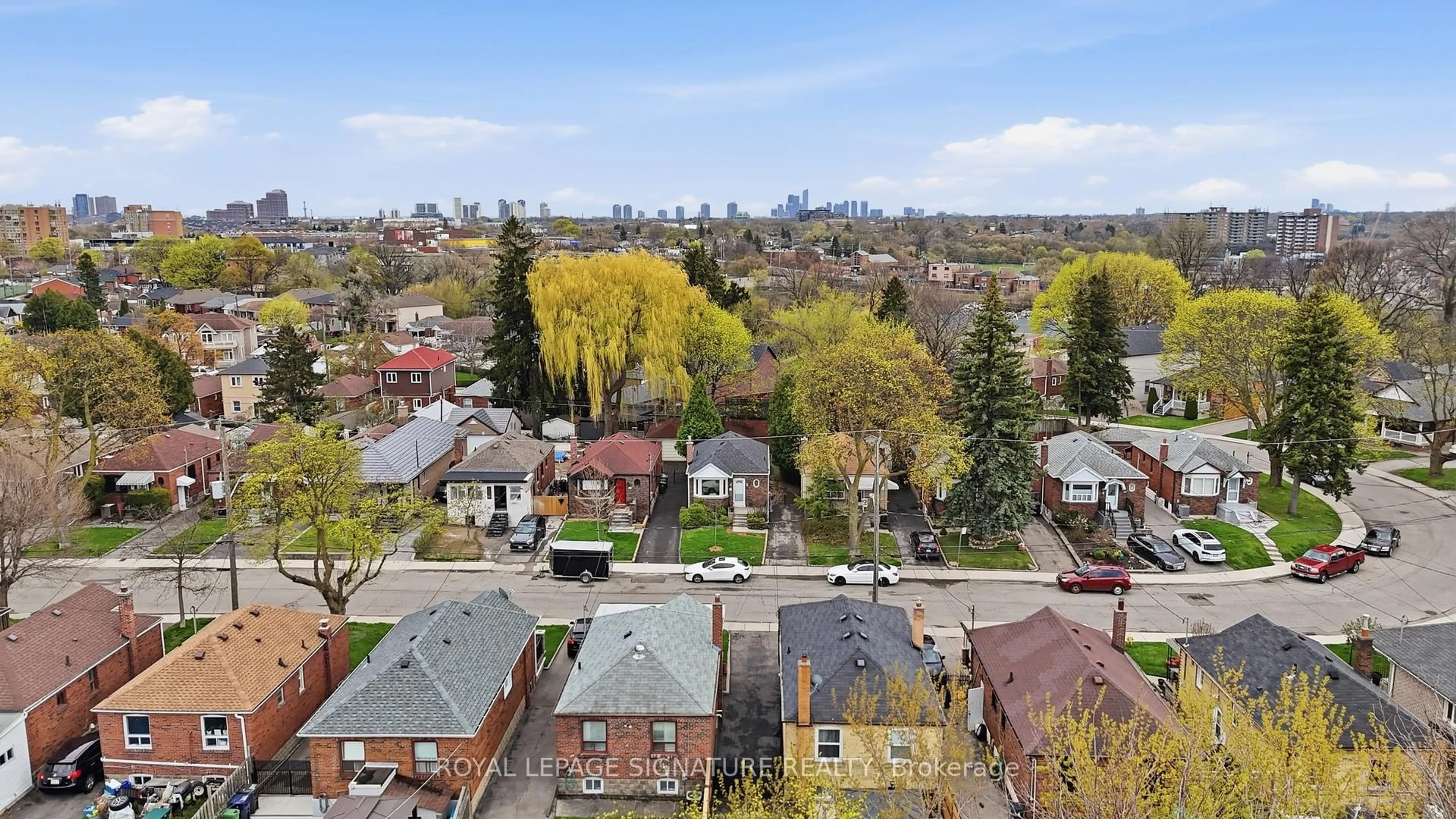 A pic from outside/outdoor area/front of a property/back of a property/a pic from drone, city buildings view from balcony for 53 Juliet Cres, Toronto Ontario M6M 1N5