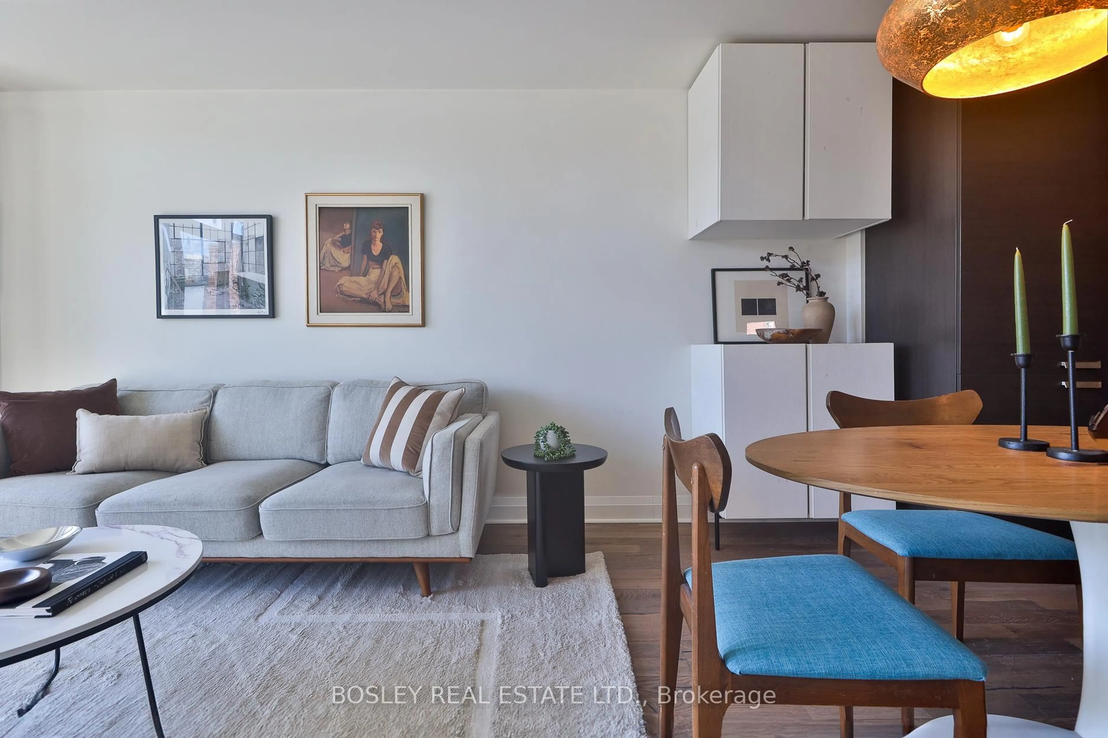 Living room with furniture, wood/laminate floor for 245 Perth Ave #103, Toronto Ontario M6P 3X9