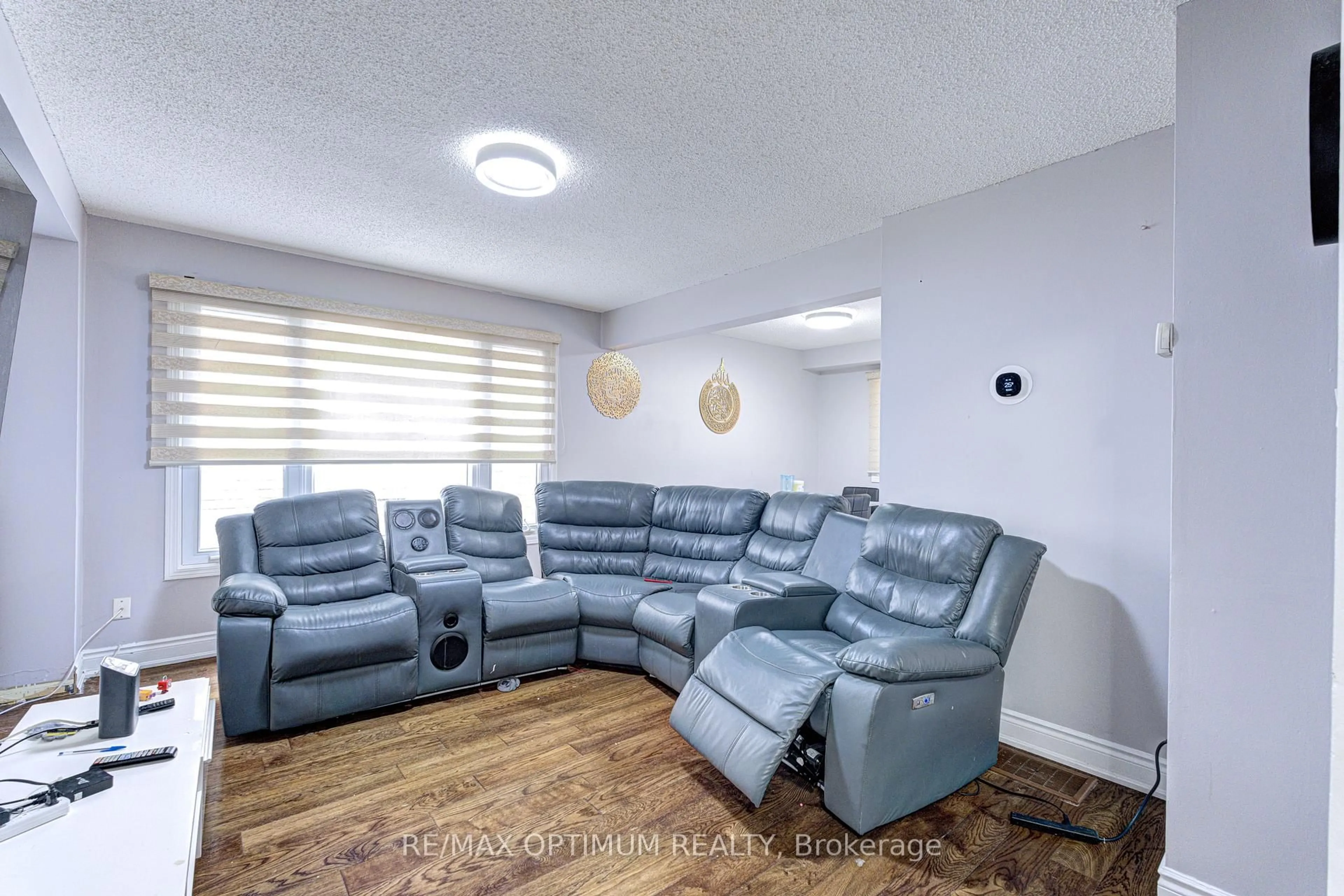 Living room with furniture, unknown for 5 Roehampton Cres, Brampton Ontario L6Y 2R3