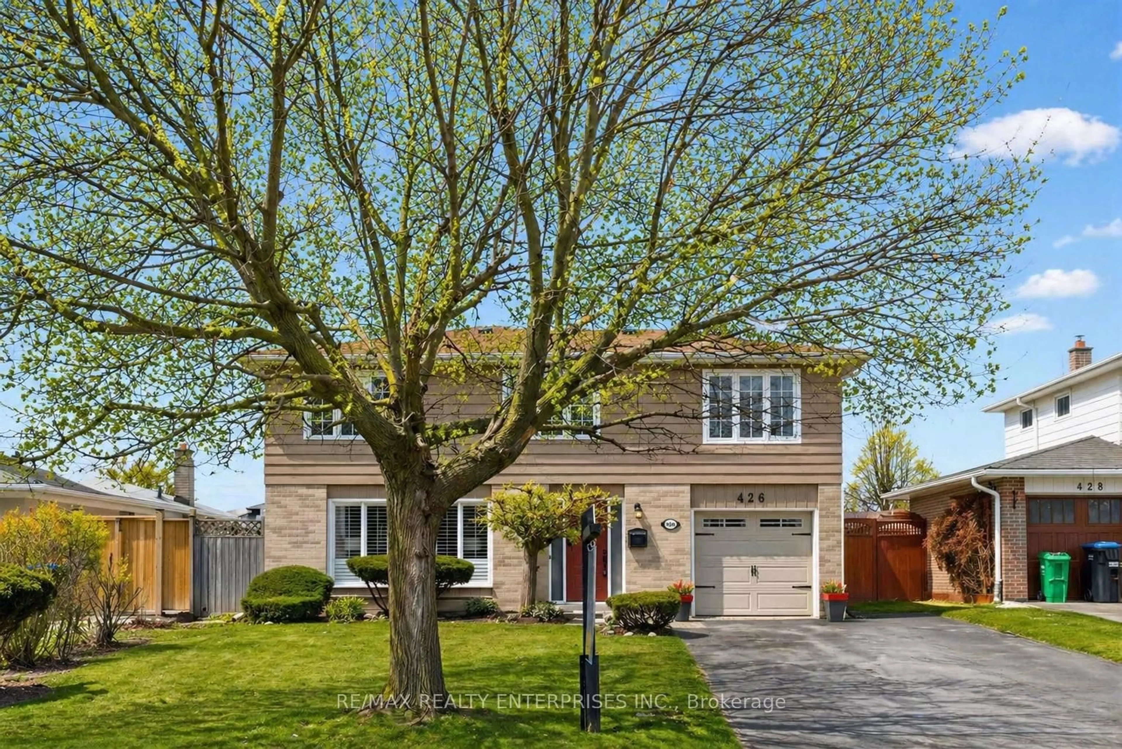 Home with vinyl exterior material, street for 426 Bartley Bull Pkwy, Brampton Ontario L6W 2M5