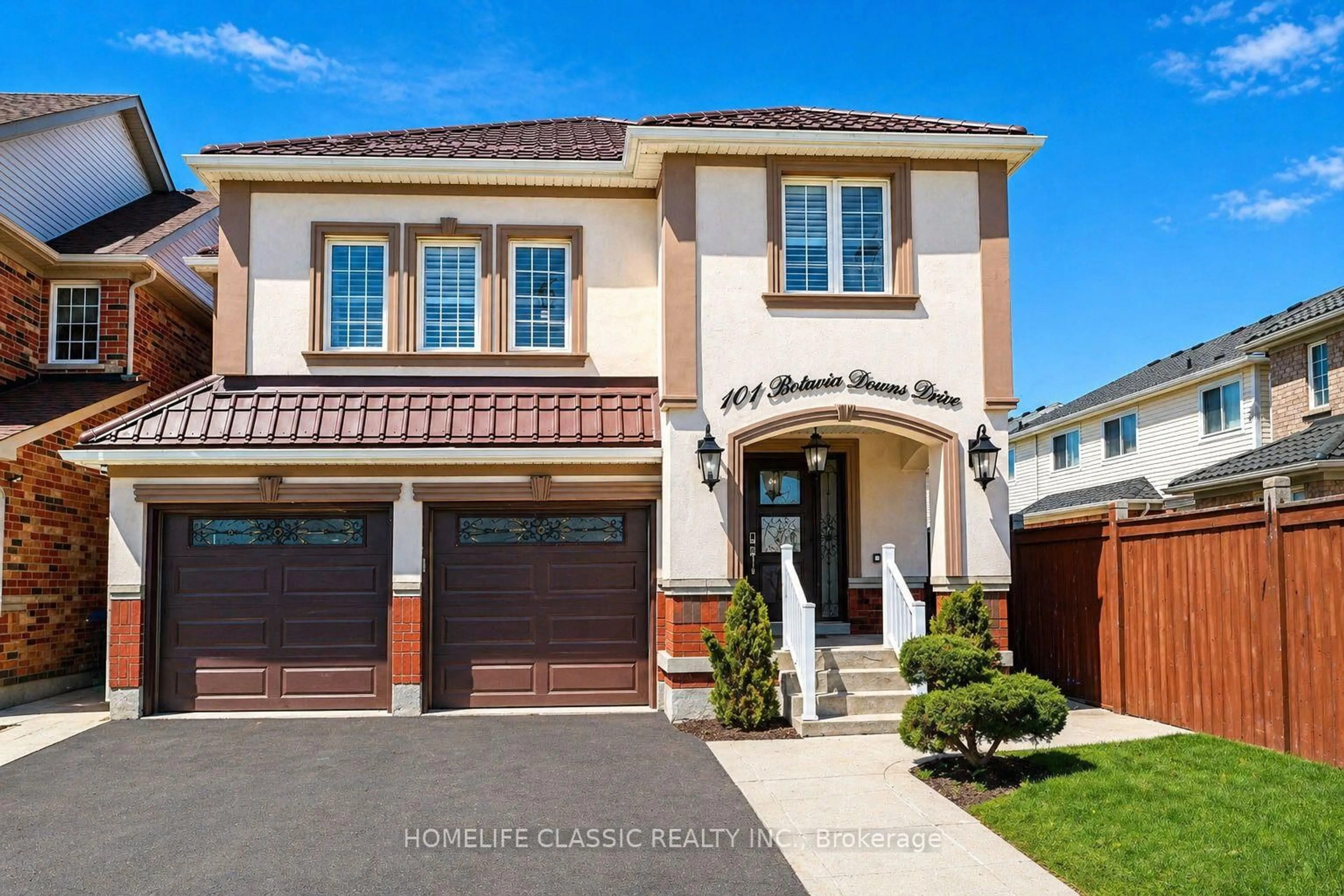 Home with brick exterior material, street for 101 Botavia Downs Dr, Brampton Ontario L7A 3P6