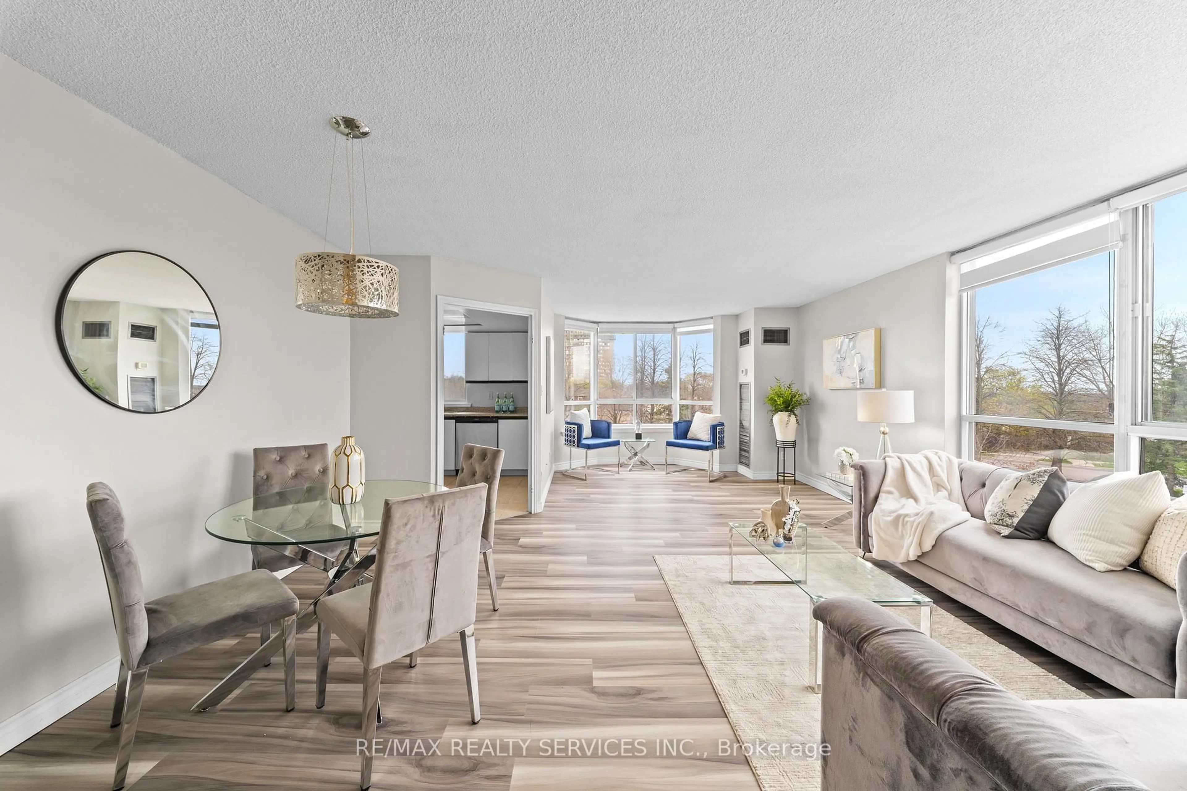 Living room with furniture, unknown for 1001 Cedarglen Gate #307, Mississauga Ontario L5C 4R2
