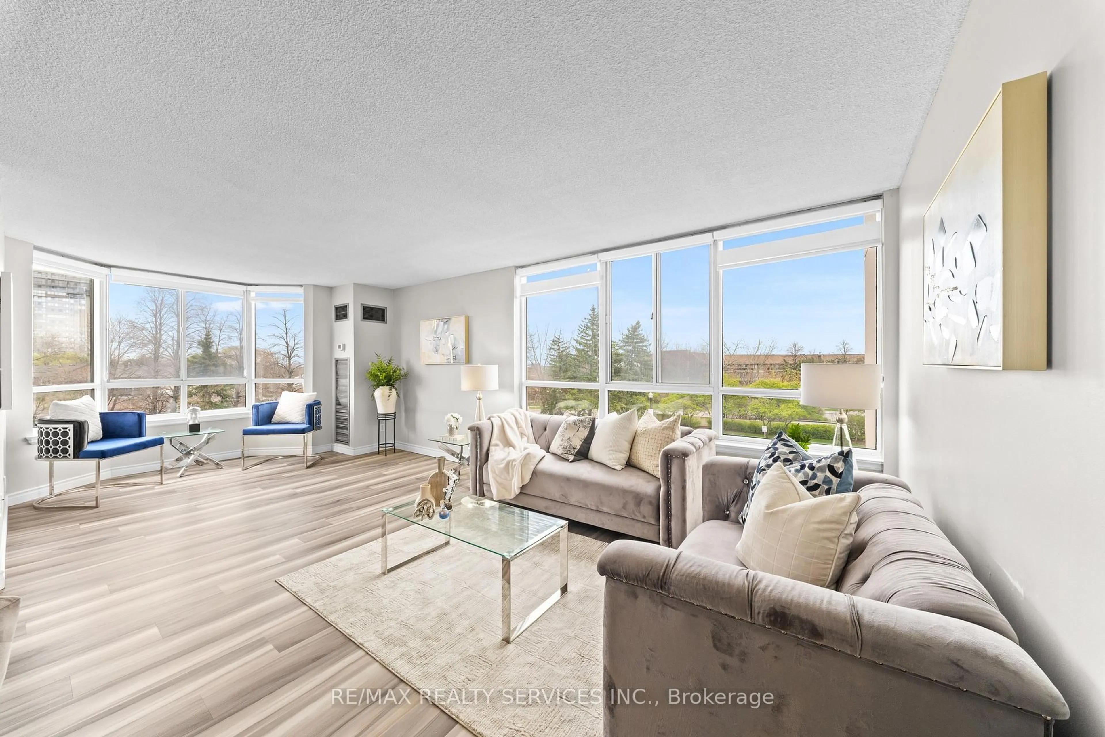 Living room with furniture, unknown for 1001 Cedarglen Gate #307, Mississauga Ontario L5C 4R2