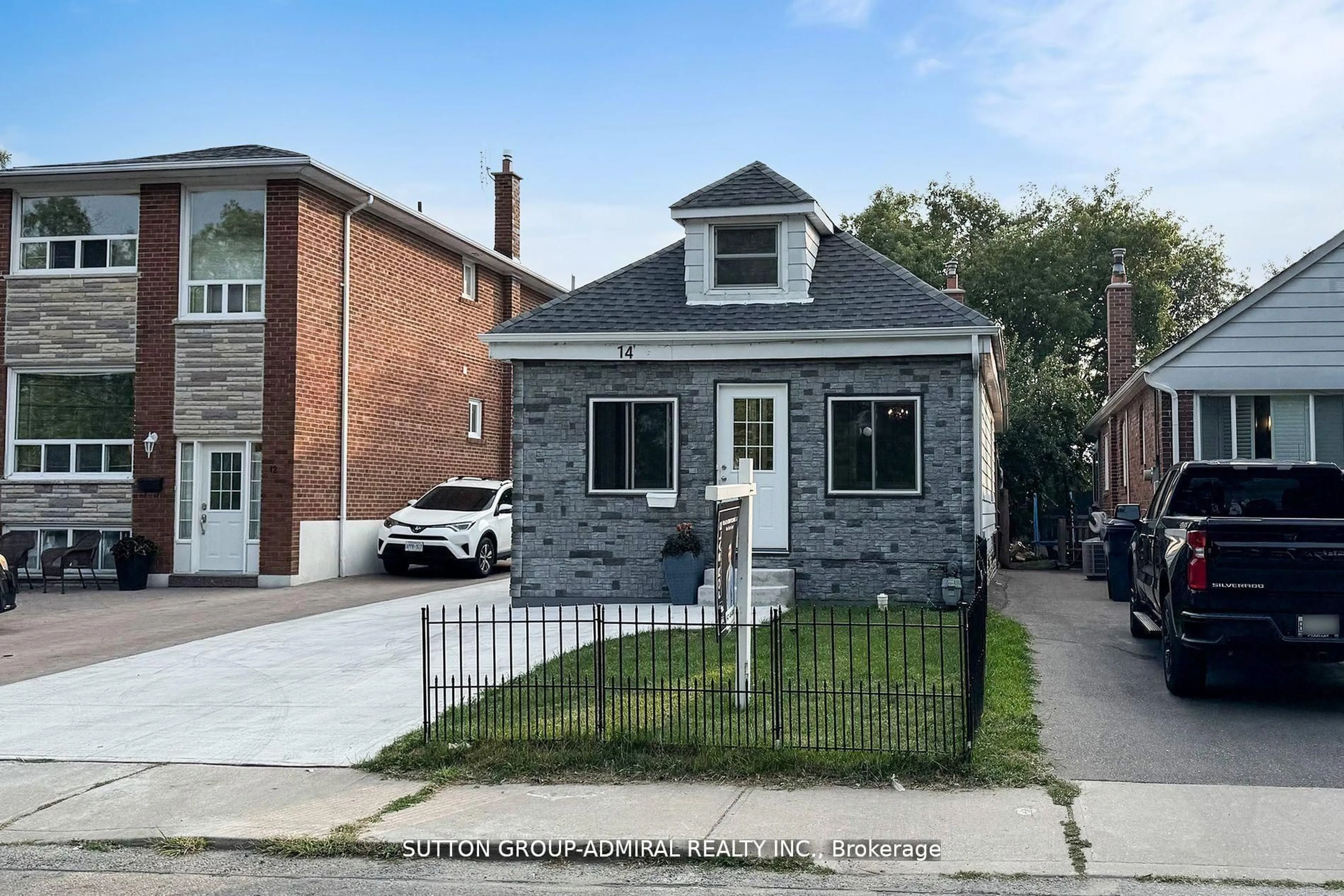 Home with brick exterior material, street for 14 Spears St, Toronto Ontario M6N 3X7
