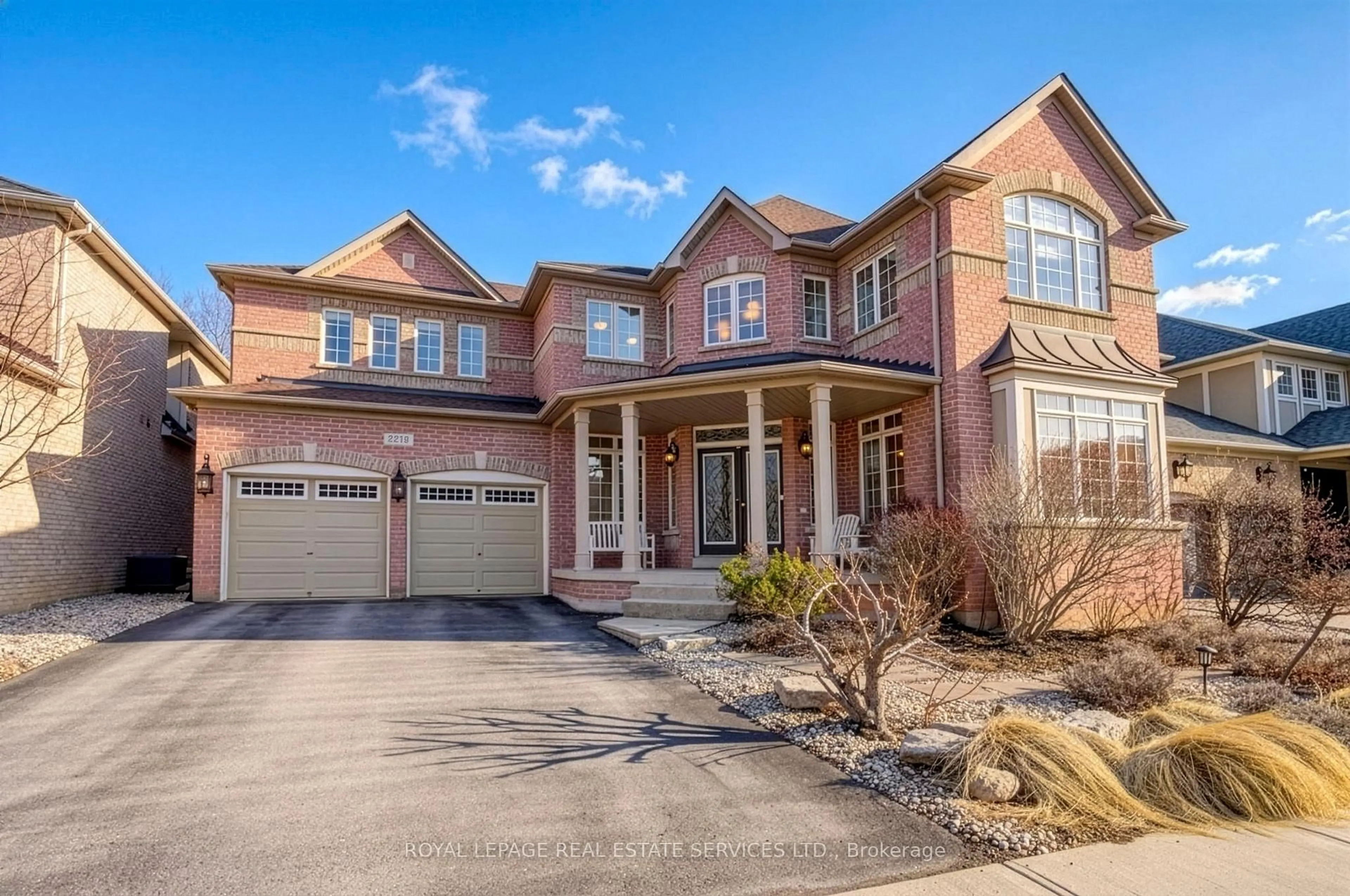Home with brick exterior material, street for 2219 Wuthering Heights Way, Oakville Ontario L6M 0A3