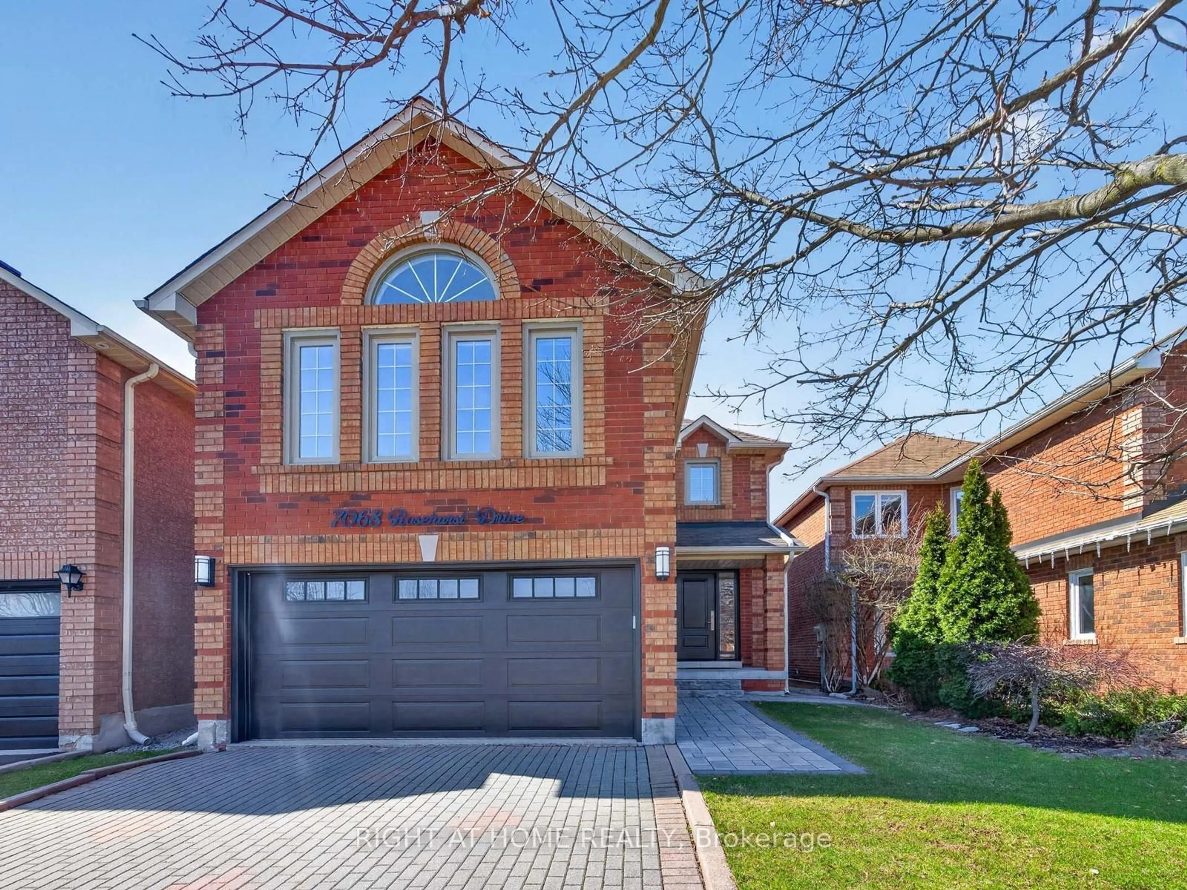 Home with brick exterior material, street for 7068 Rosehurst Dr, Mississauga Ontario L5N 6Y8