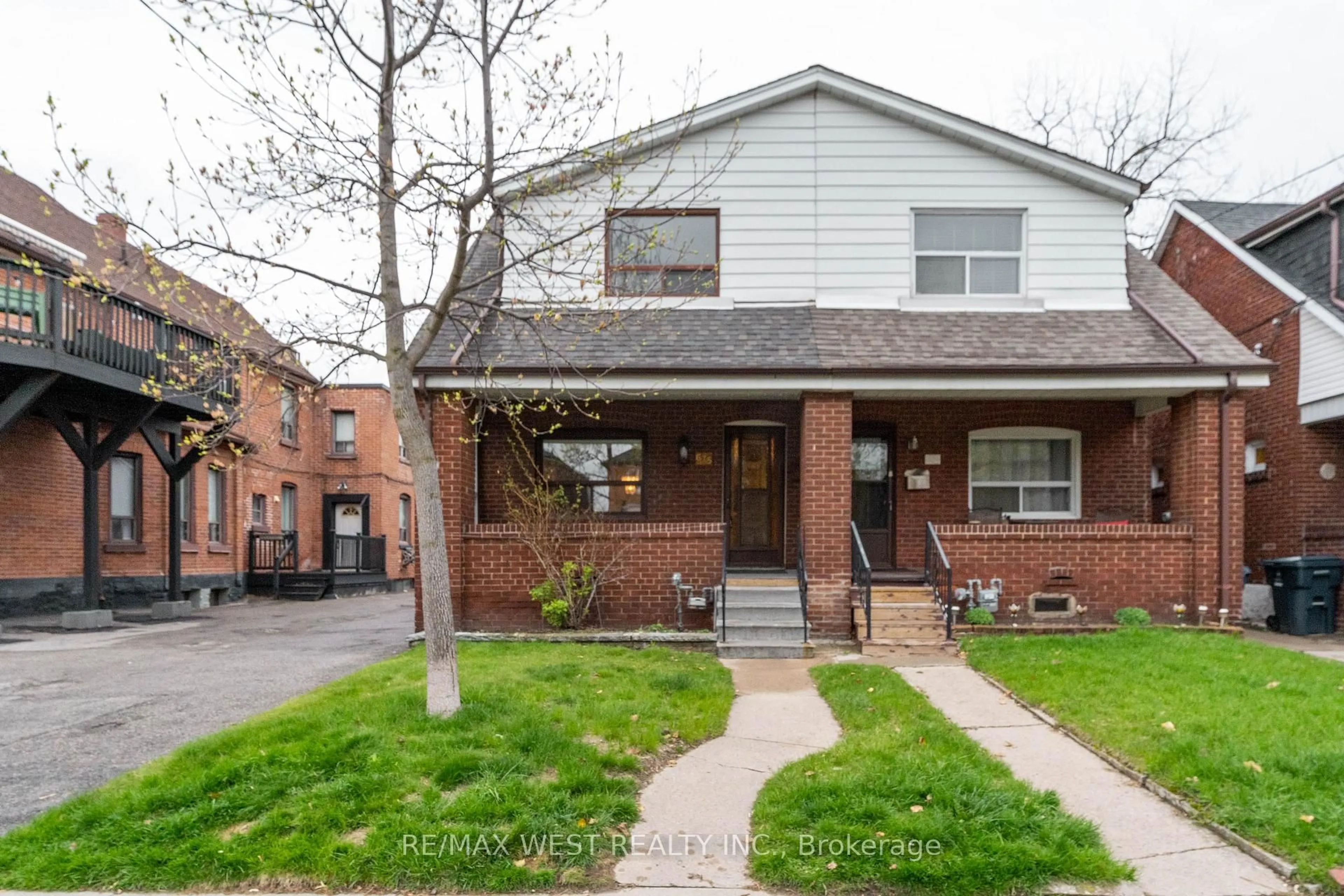 Home with brick exterior material, street for 675 Durie St, Toronto Ontario M6S 3H4