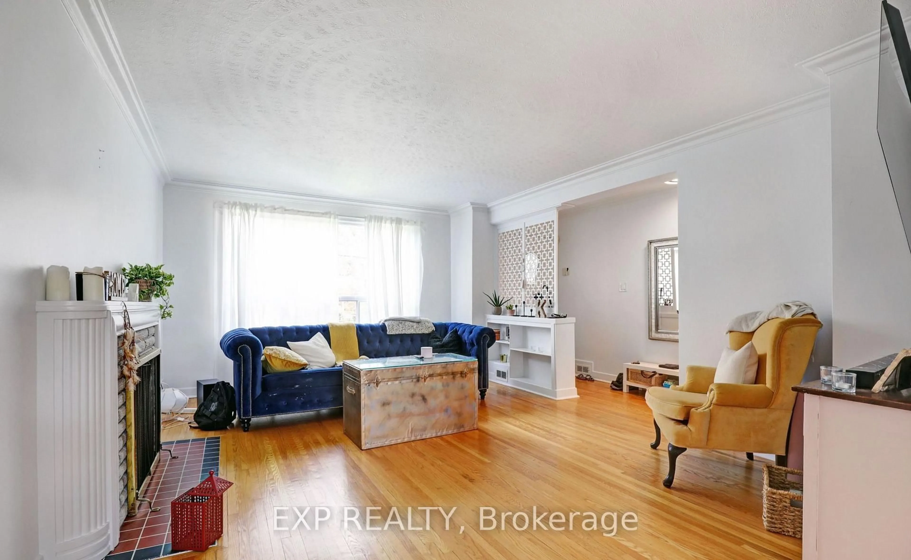 Living room with furniture, wood/laminate floor for 142 thompson Ave, Toronto Ontario M8Z 3V2