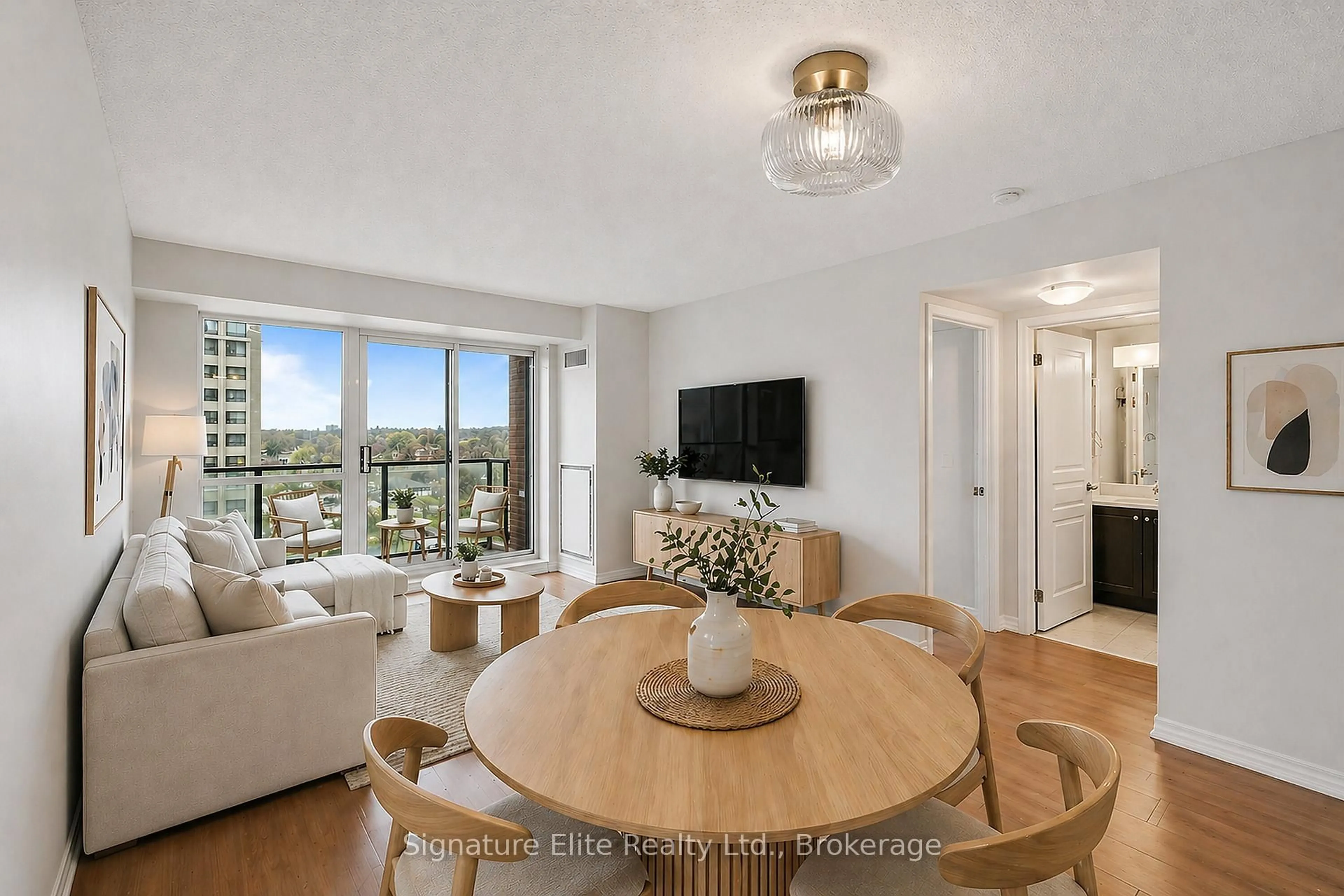 Living room with furniture, wood/laminate floor for 1403 Royal York Rd #909, Toronto Ontario M9P 0A1
